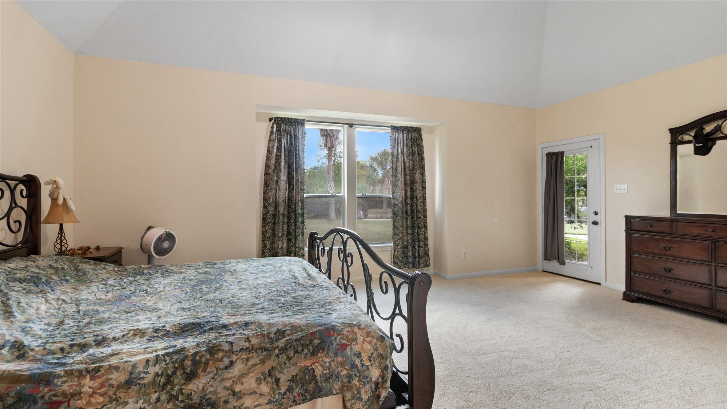 Direct backyard access adds an extra layer of convenience to the primary suite.