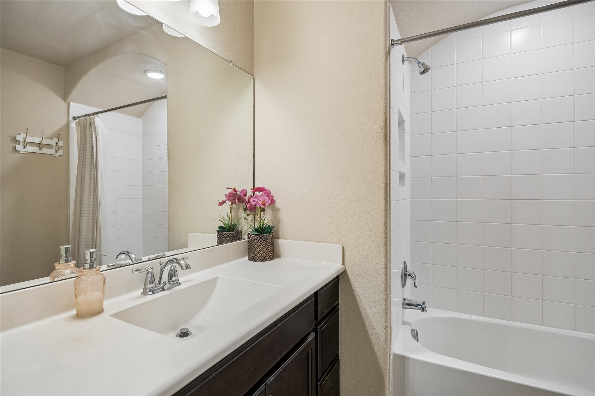 Third bathroom of off the third upstairs bedroom.  Great for guests to have some privacy.