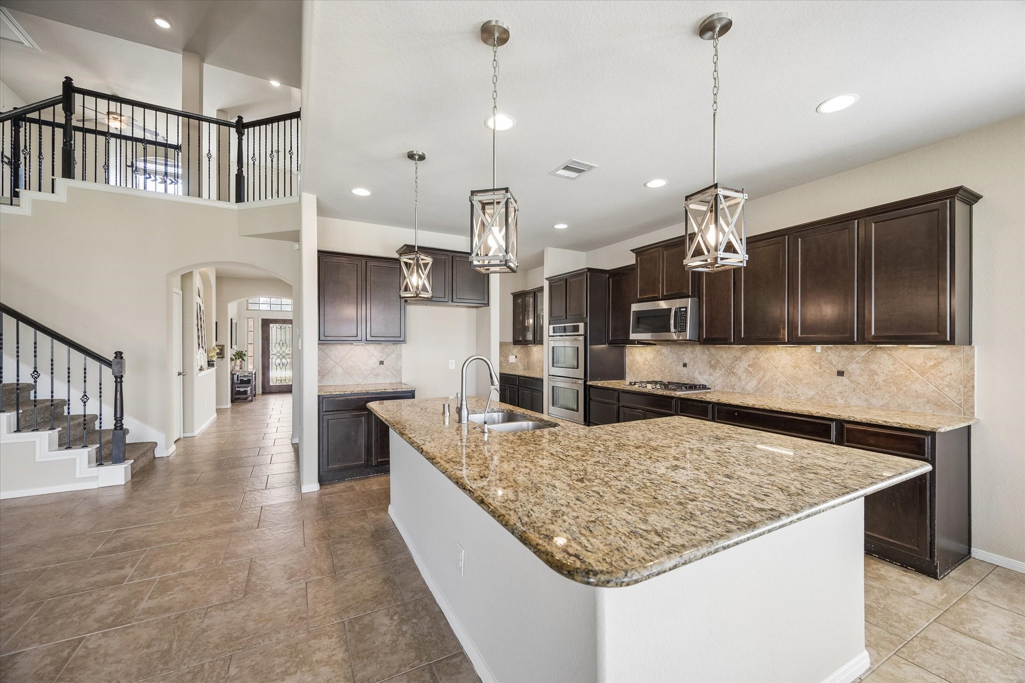 Kitchen flows right into the living room.