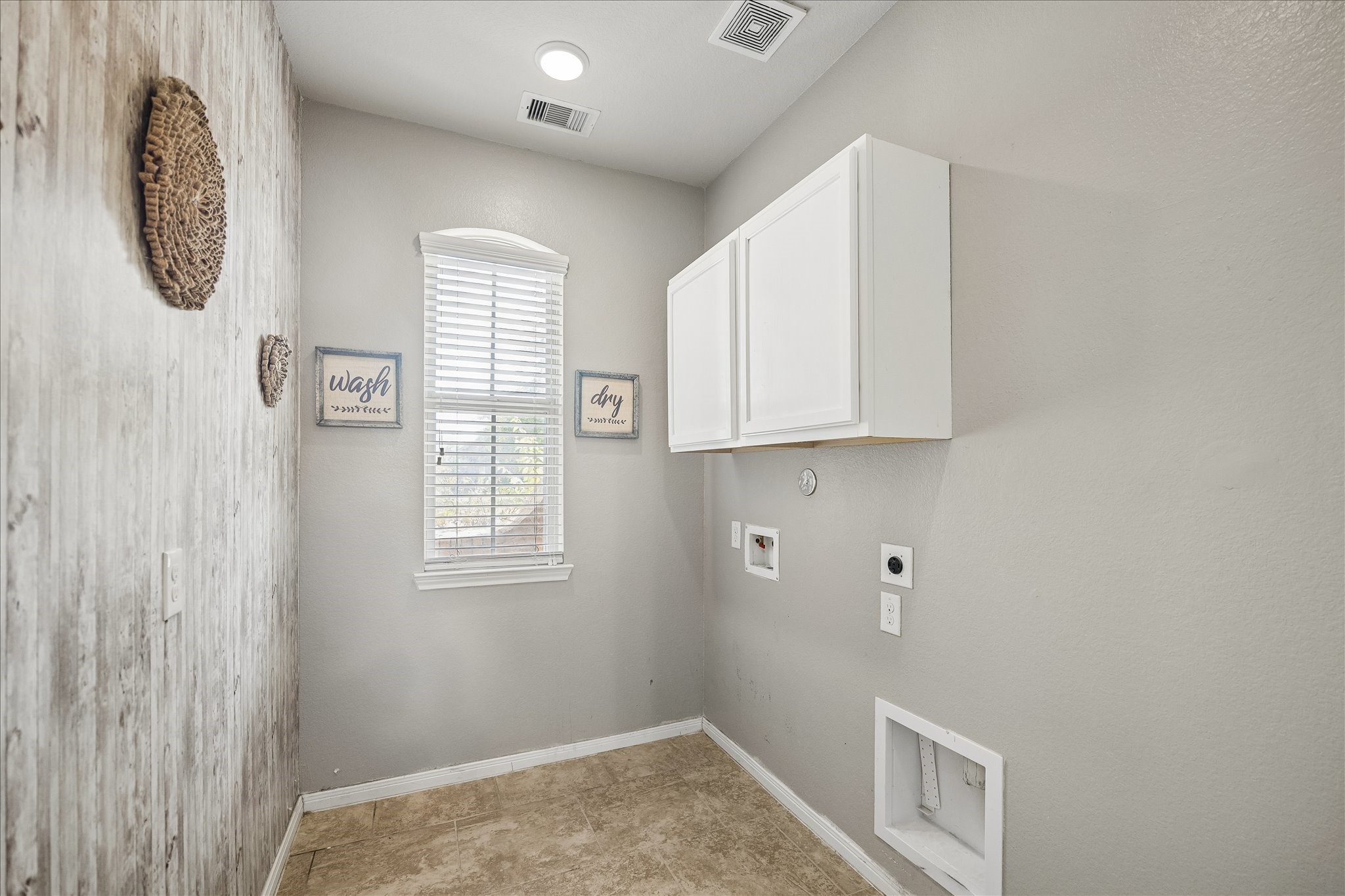 Large laundry room downstairs.