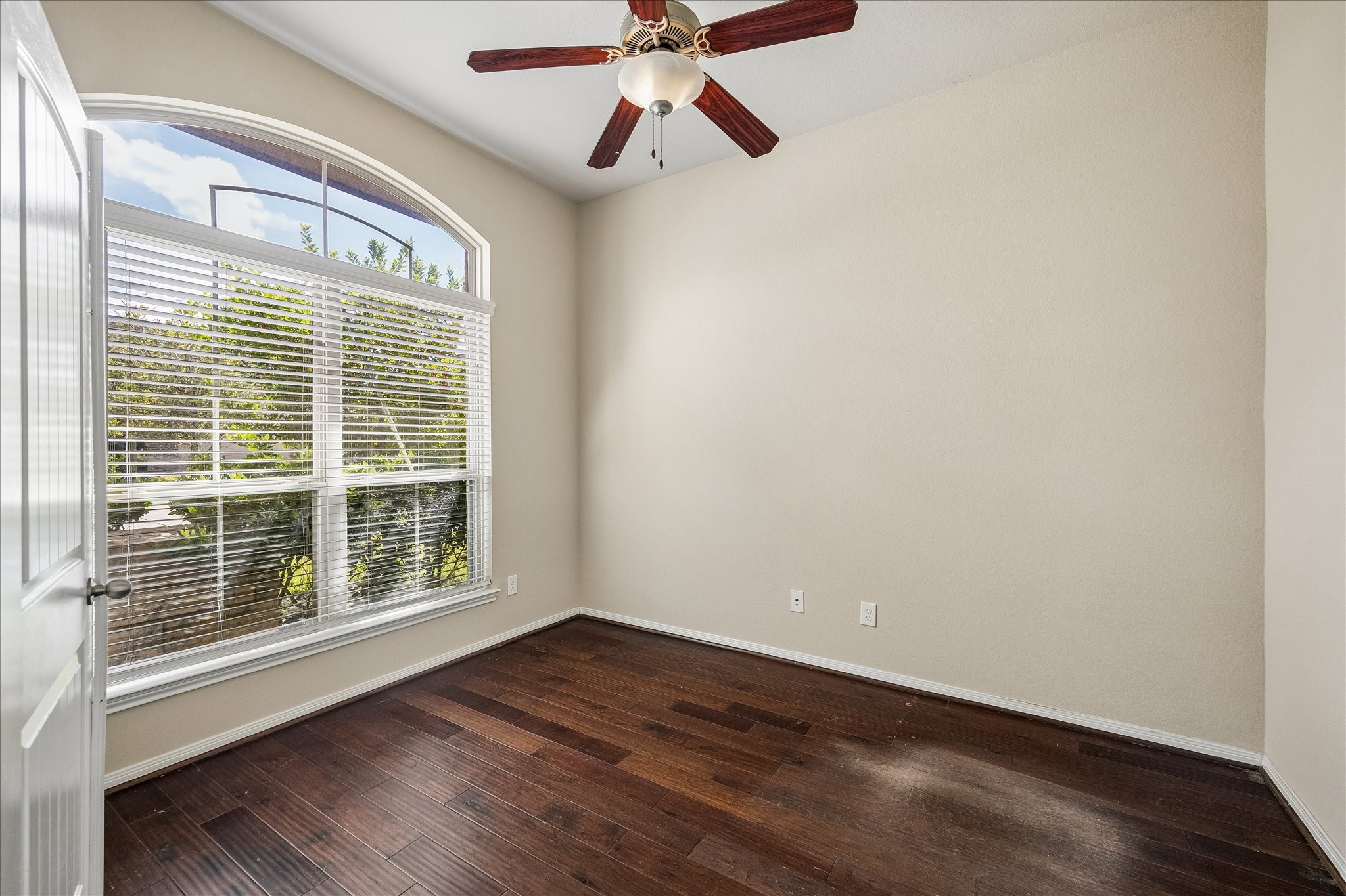 Home office with double doors for privacy.