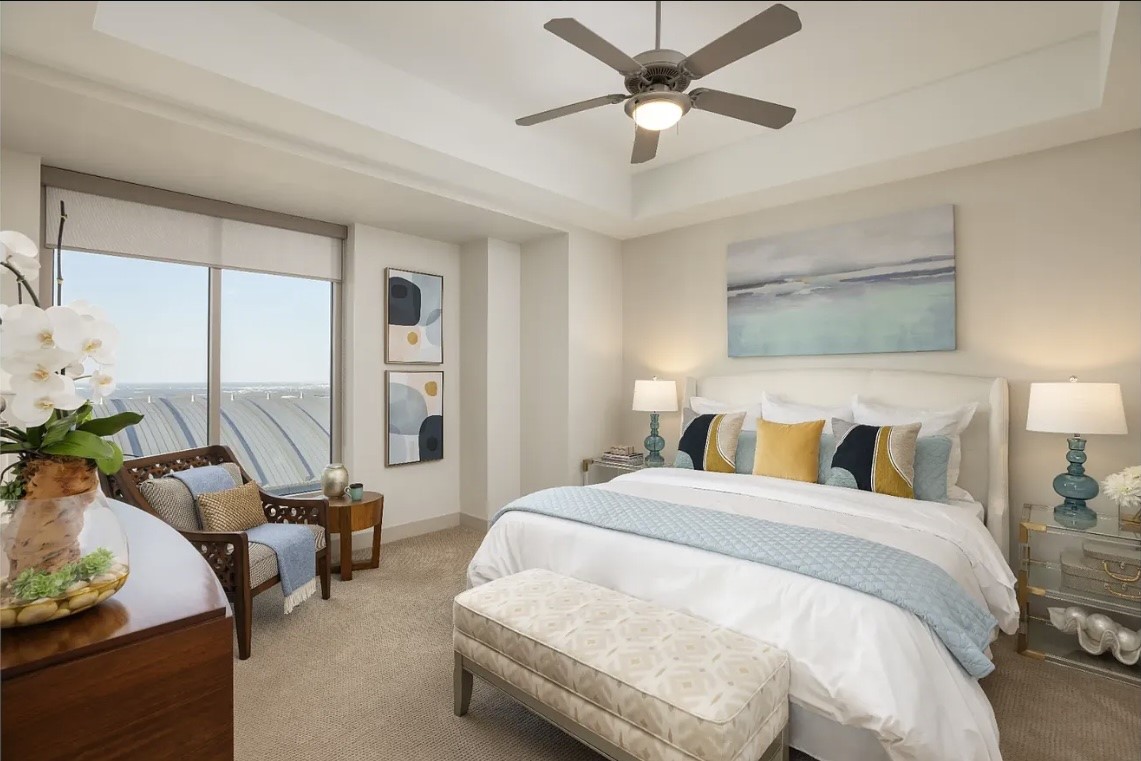 Designed for both comfort and functionality, the expansive primary suite easily accommodates a king-sized bed and additional furnishings, offering plenty of room to create your own private retreat. Oversized windows frame beautiful downtown views, adding the perfect finishing touch to this inviting space.