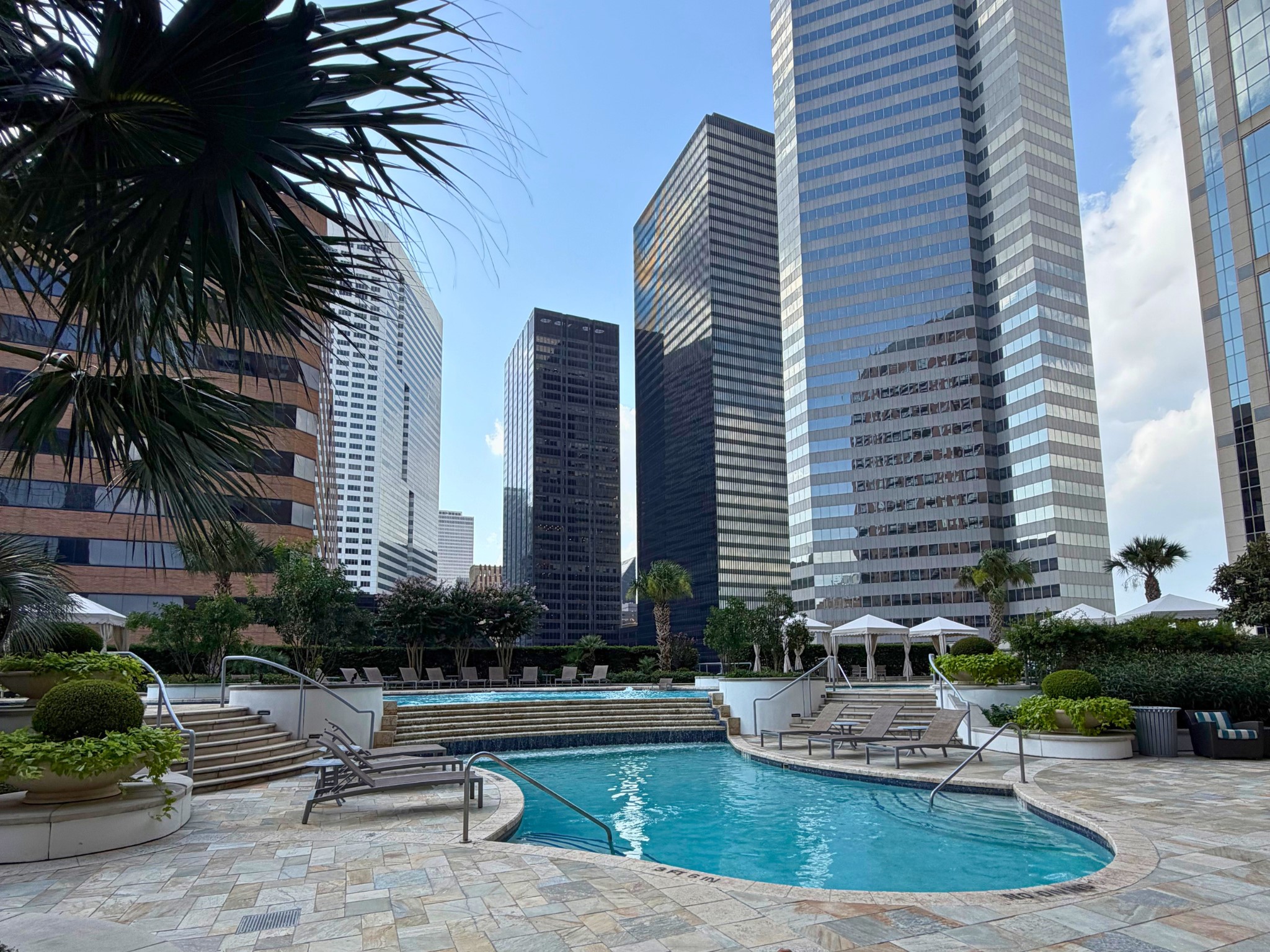 Enjoy resort-style living with a stunning pool set against Houston's iconic skyline. This beautifully designed outdoor retreat combines sparkling waters, lush landscaping and elegant cabanas to create a sophisticated escape in the heart of downtown.