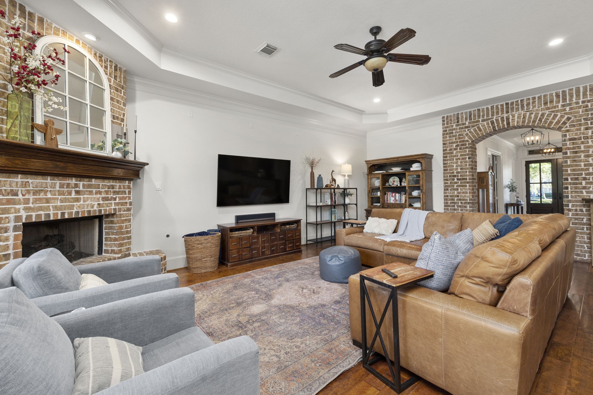 Living room offers the perfect size and layout to get cozy and comfortable with the family! Just imagine all the live performances that this fireplace will hold!