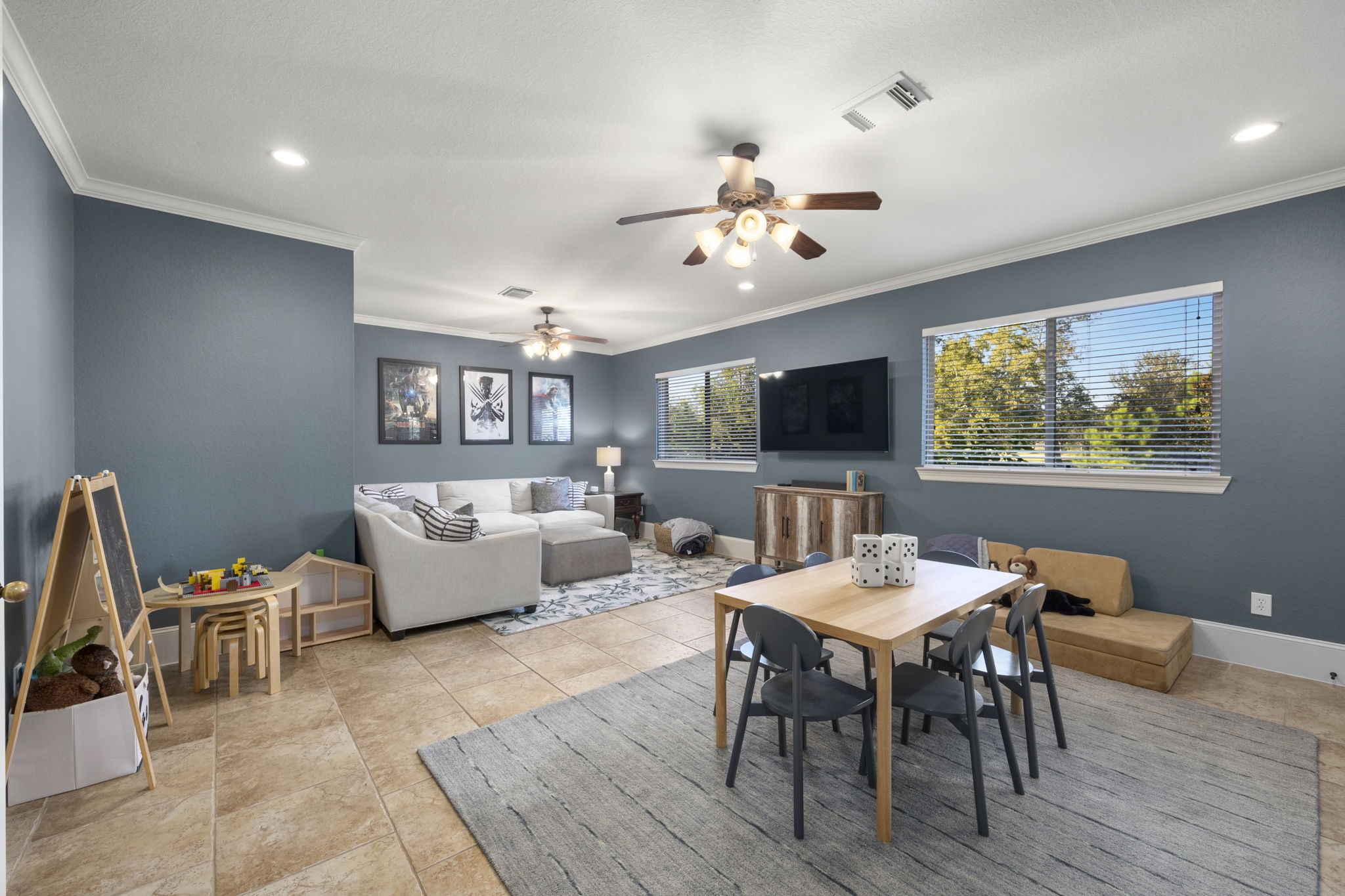 This room also features a door leading out to the covered back patio!