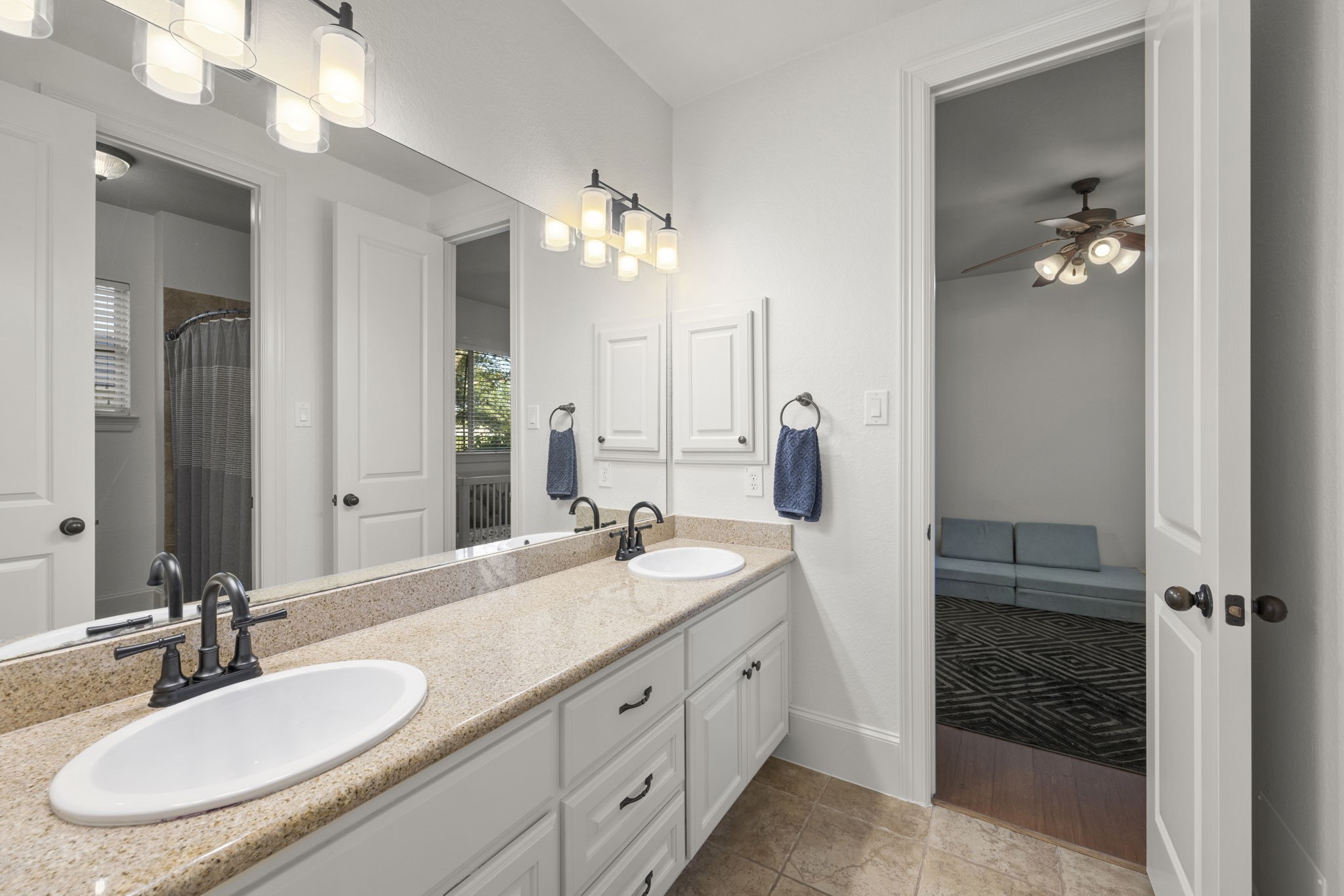 Jack and Jill bathroom is situated in between the two secondary bedrooms.
