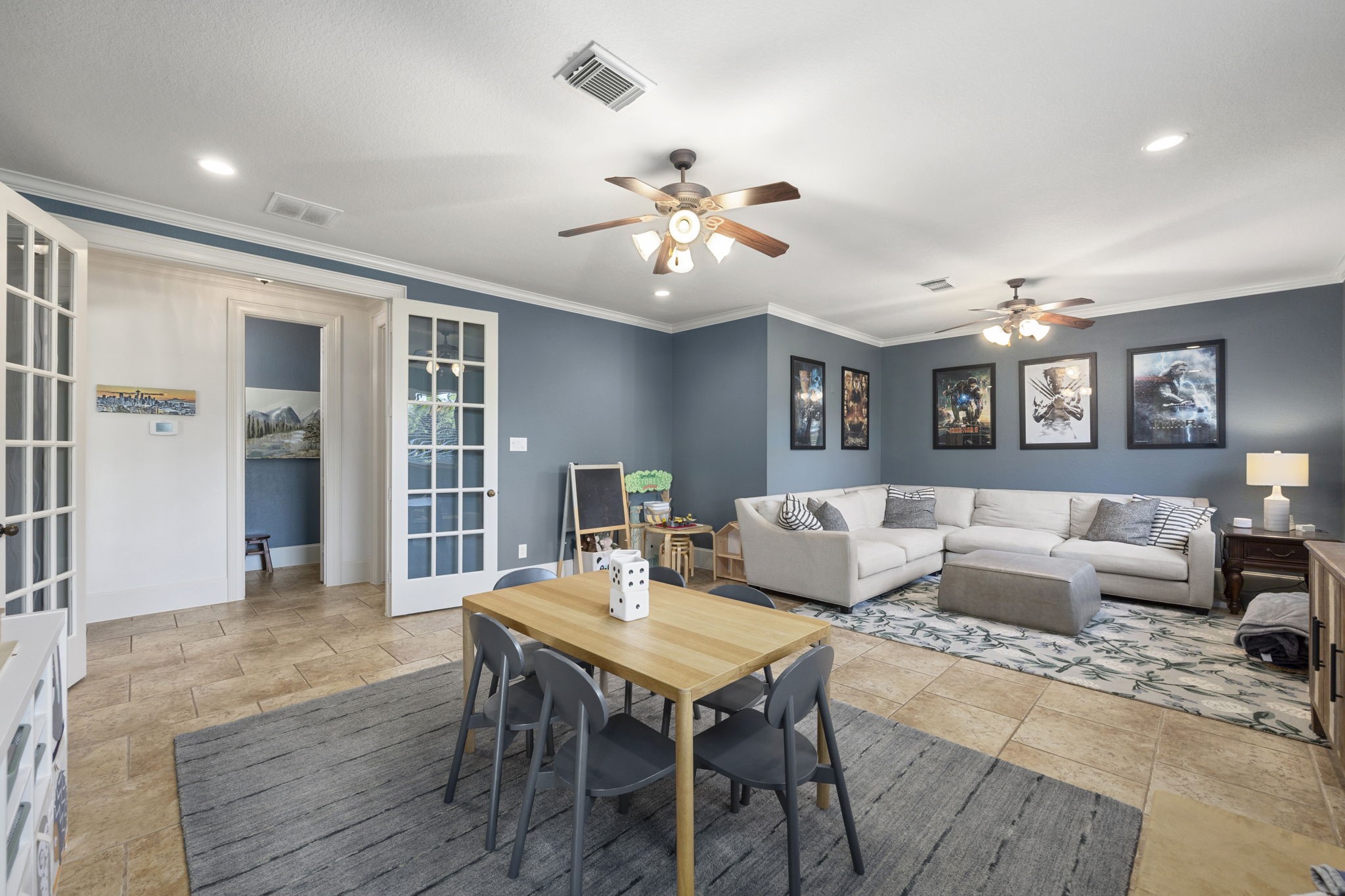 This massive gameroom is an amazing feature of this home! Movie nights, game nights, and all sorts of family/friend gatherings await!