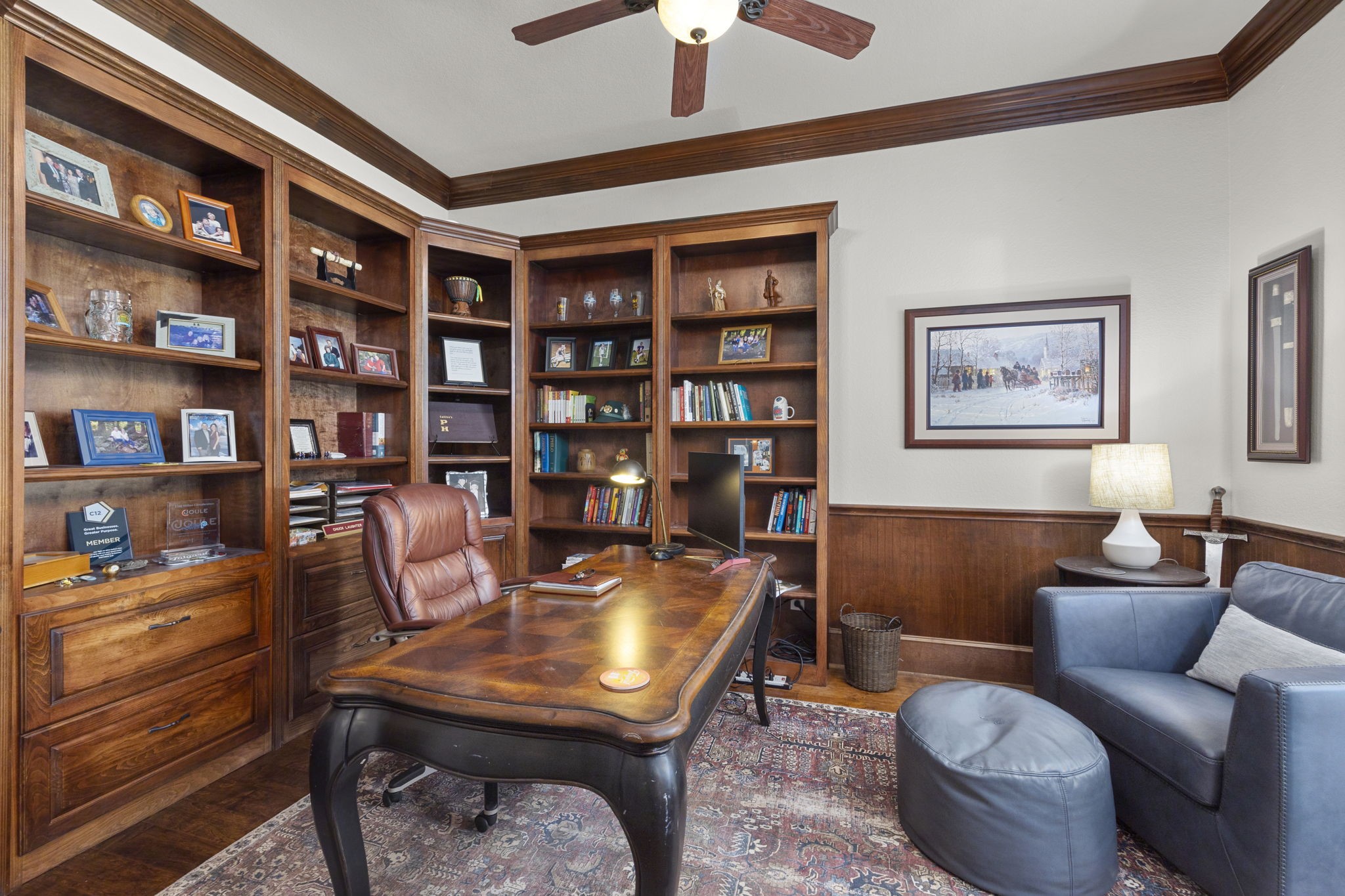 Handsome and classy home office offers the perfect spot to be productive working from home!