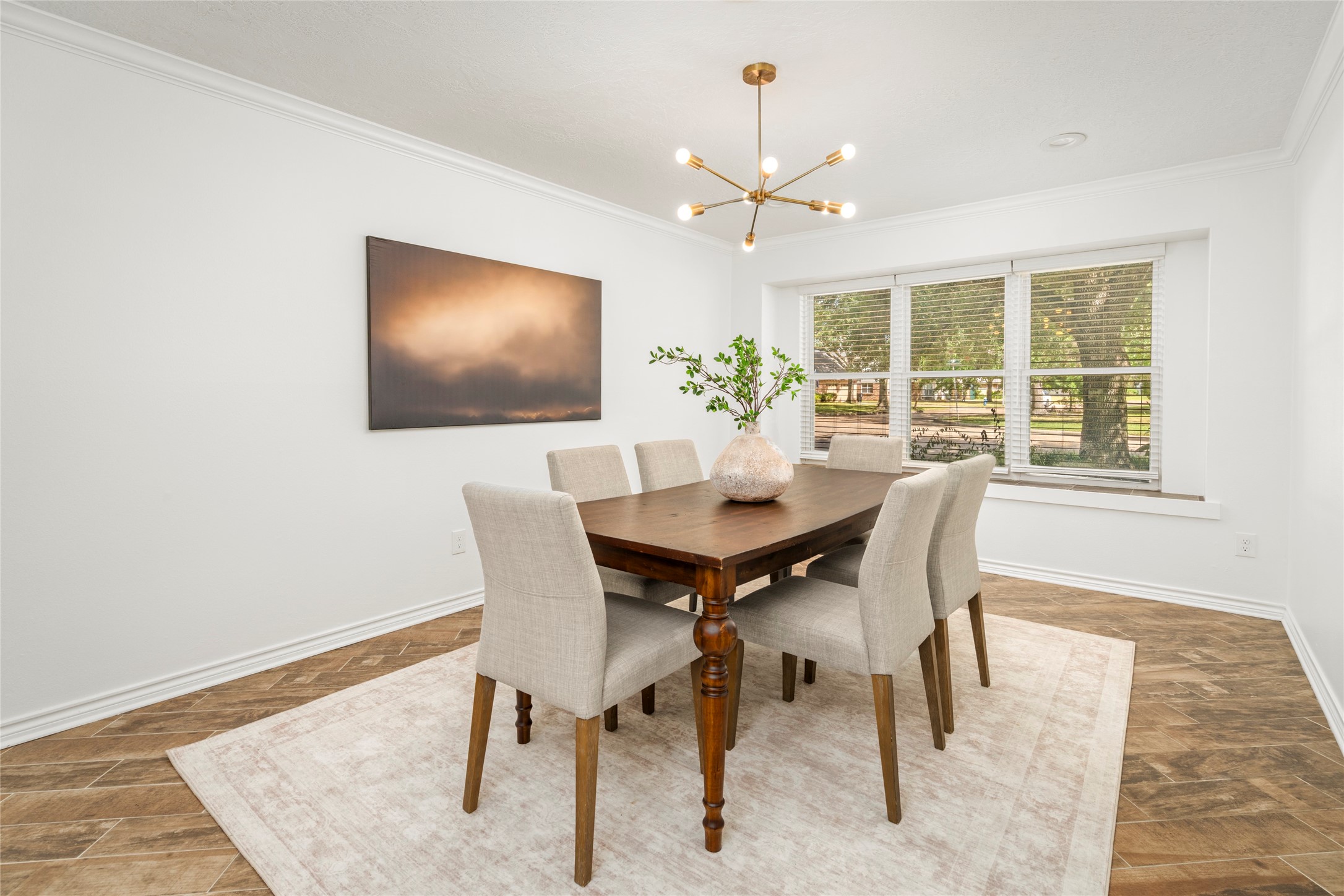 The large dining room sits at the front of the house and opens to the living room, offering the perfect amount of defined space and flow