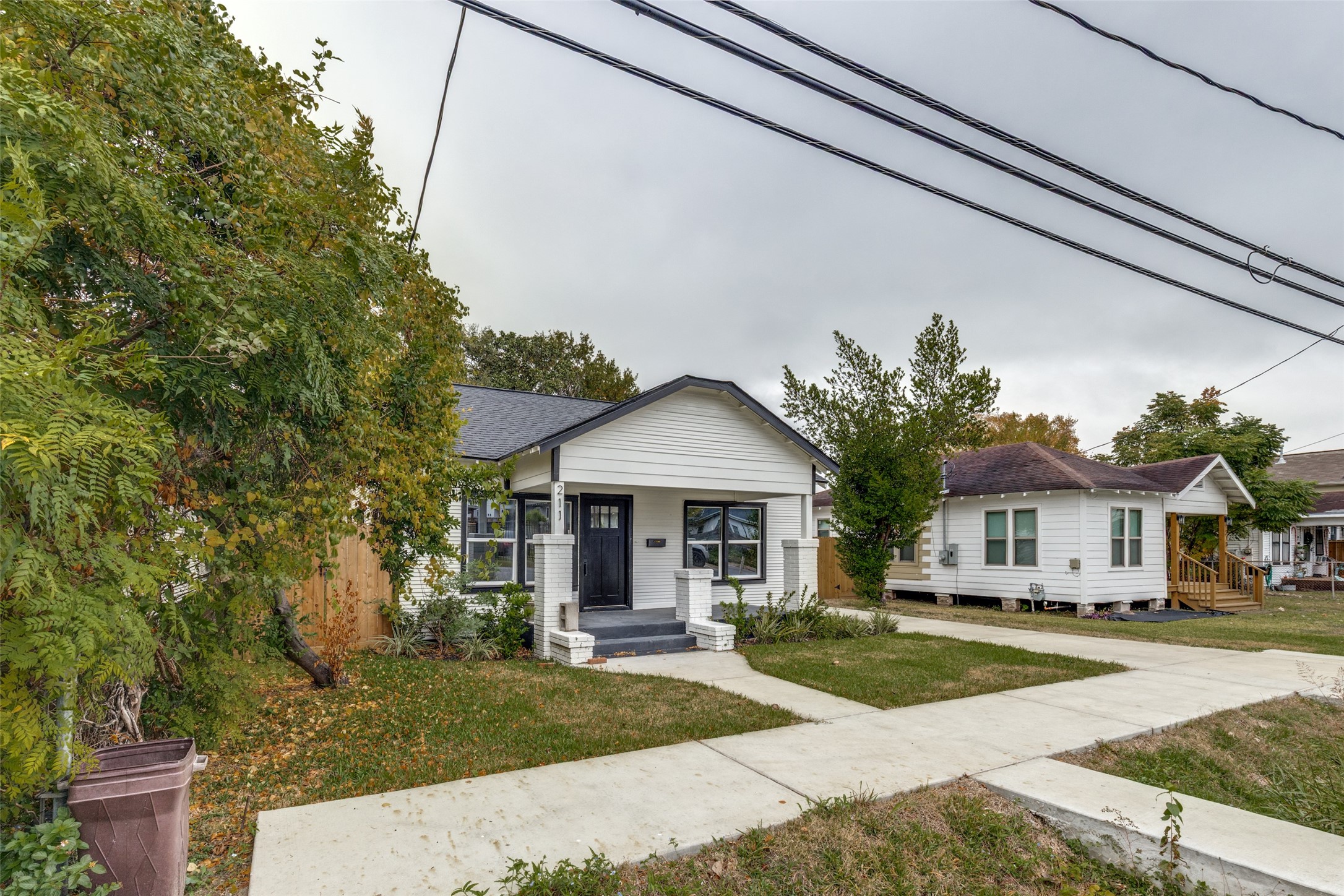 Picture coming home to this inviting porch and clean modern entry, a top to bottom rebuild that feels brand new inside Picture coming home to this inviting porch and clean modern entry, a top to bottom rebuild that feels brand new inside