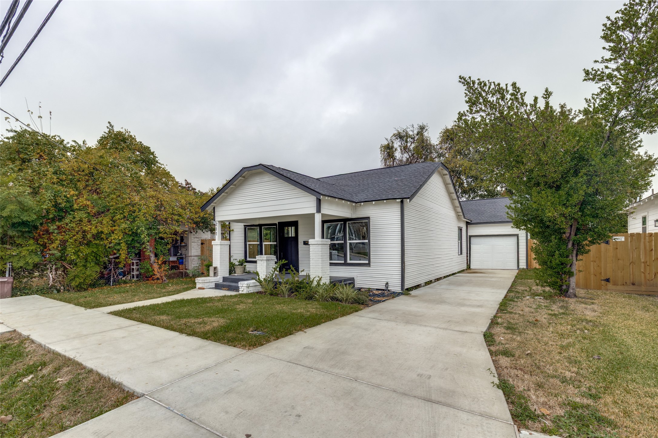 Rare for the neighborhood: a private driveway plus a private one car garage, real everyday convenience in the city. Rare for the neighborhood: a private driveway plus a private one car garage, real everyday convenience in the city.