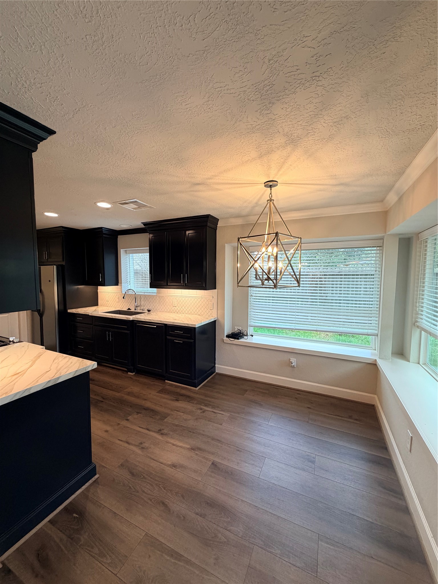 Dining Area with custom light fixture