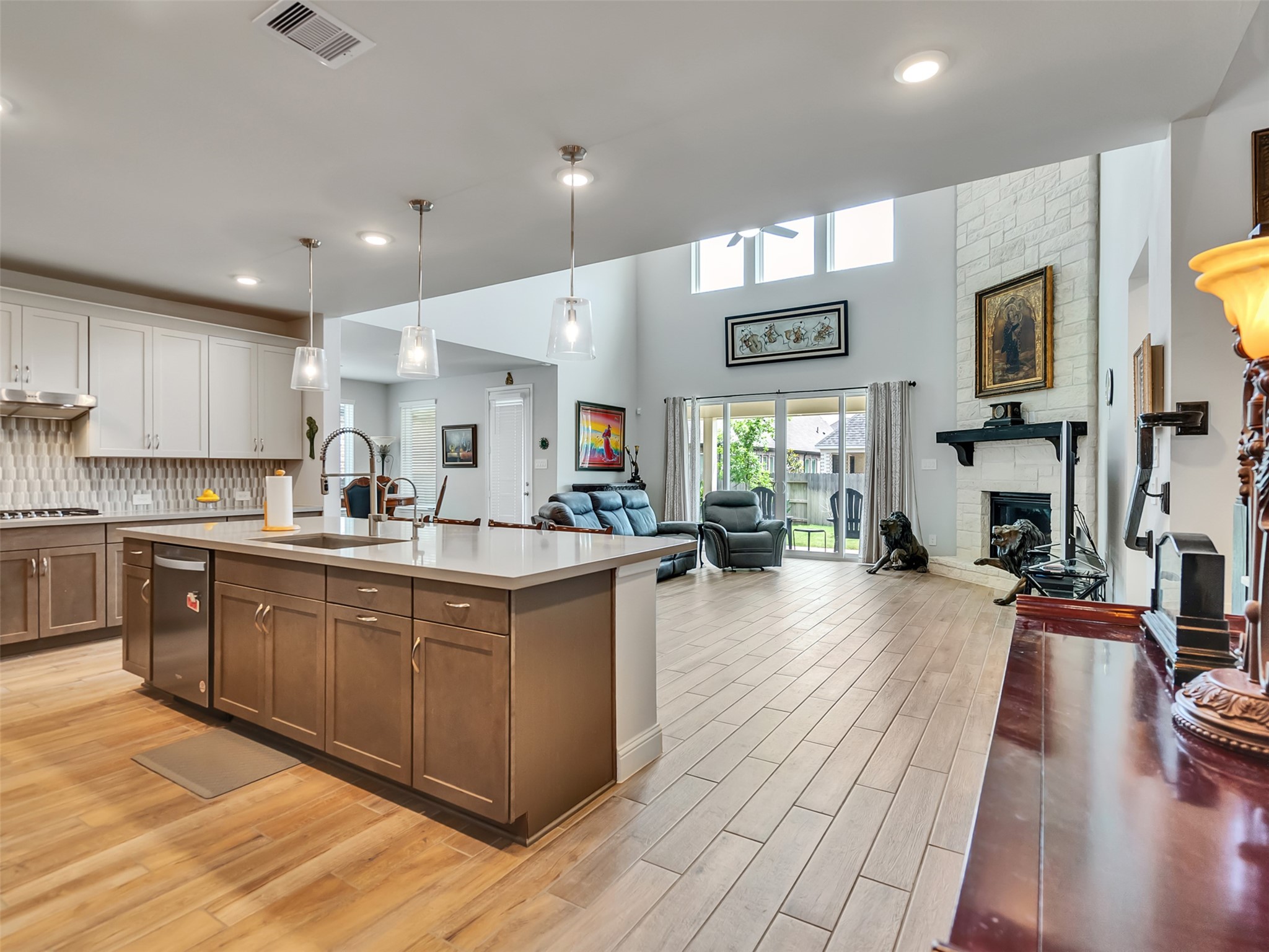 two large sliding glass doors provide easy access to the outdoors