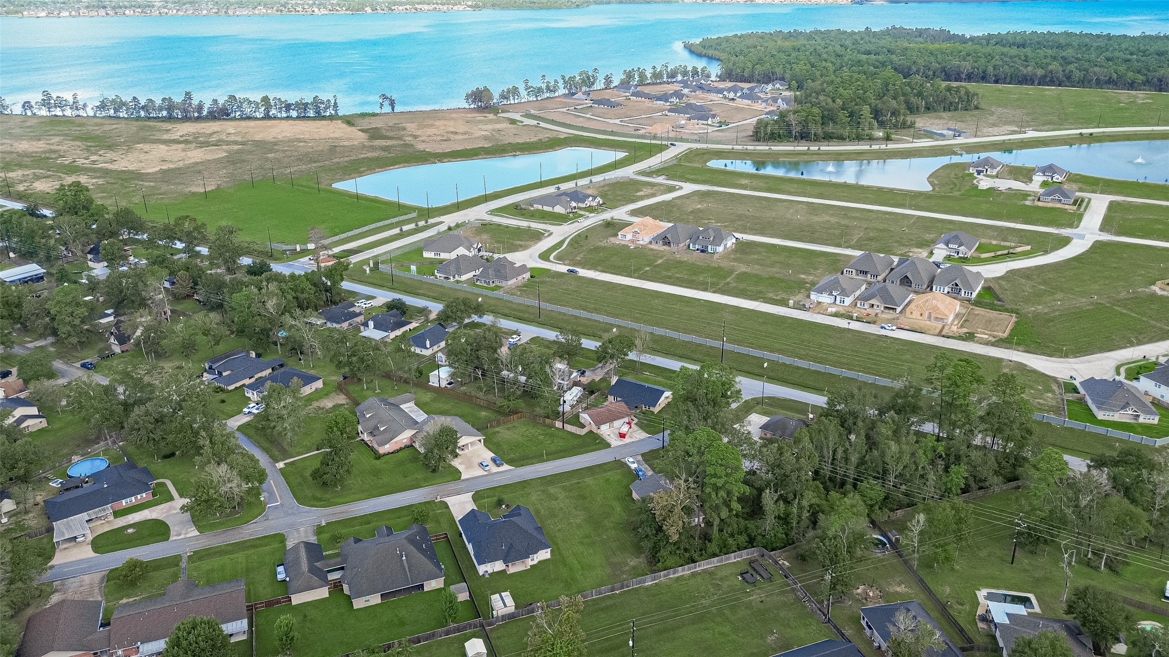 Beautiful aerial perspective of the Lake Shadows neighborhood, showcasing the surrounding residential area and nearby waterways.