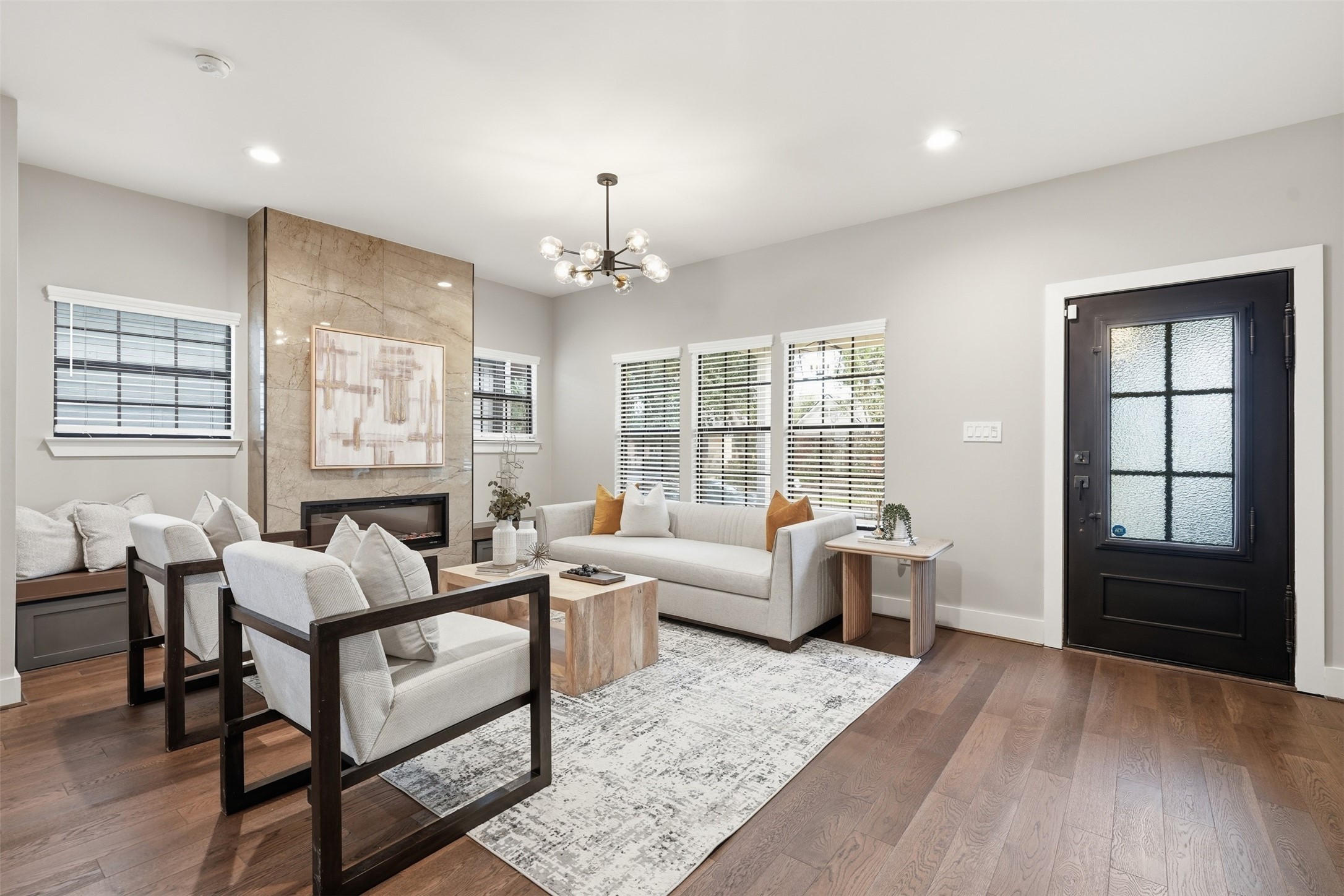 Spacious living room featuring elegant finishes and beautiful hardwood floors