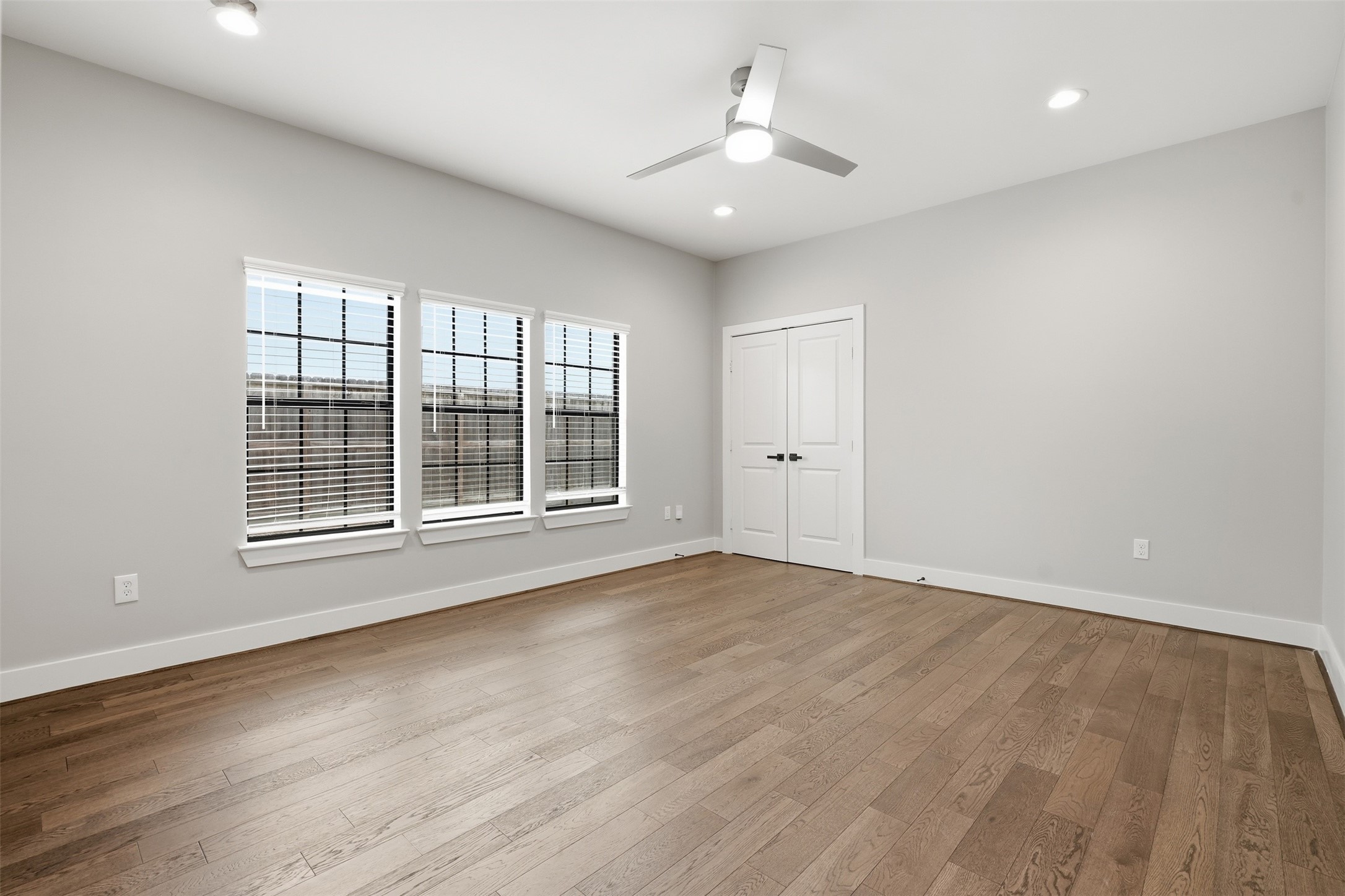 Spacious secondary bedroom with abundant natural light
