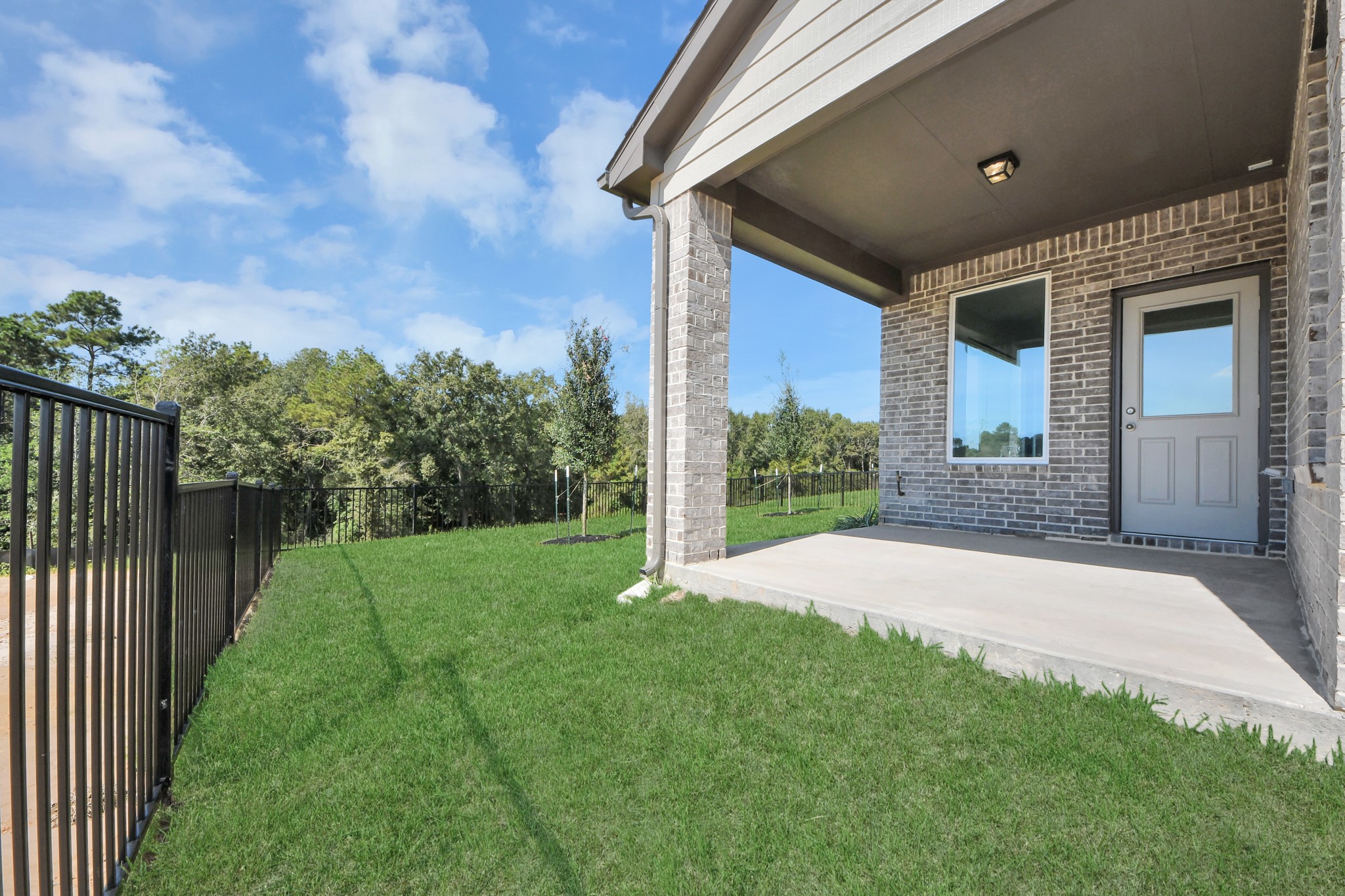 Come and see this spacious backyard with its beautiful covered patio. There is plenty of room for the kids to play and adults to relax. Perfect for your outdoor living space, patio furniture, bbq pit, and so much more. The possibilities are endless!