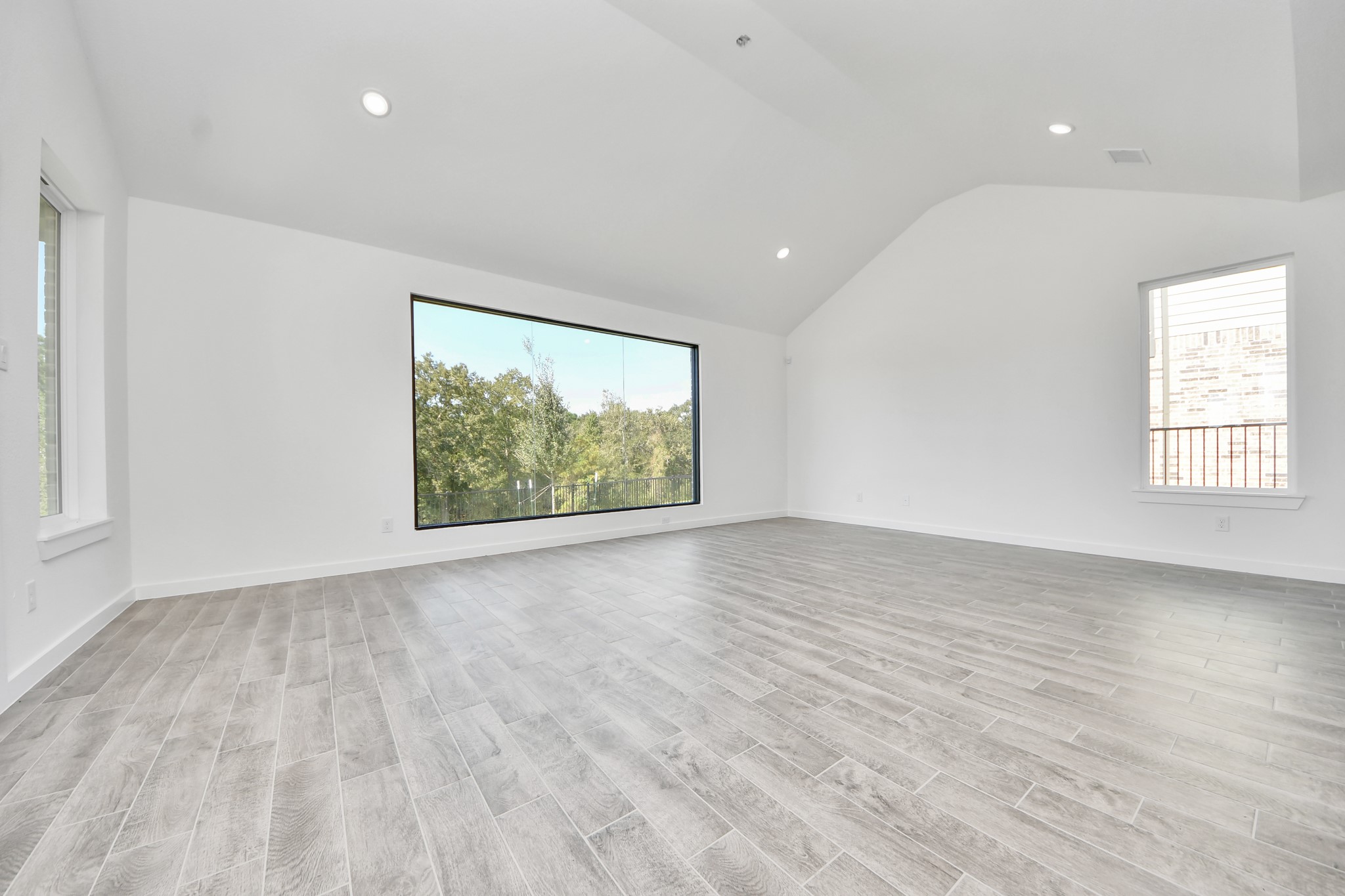Take another glimpse into the heart of the home with this additional view of the family rooma sprawling space ready to accommodate all your gatherings.
