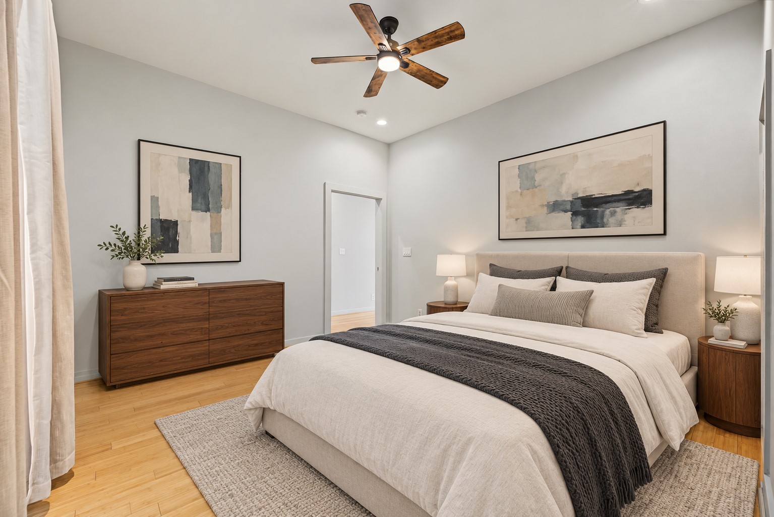 Imagine unwinding at the end of the day in this spacious bedroom with tons of natural light. Photo is virtually-staged.