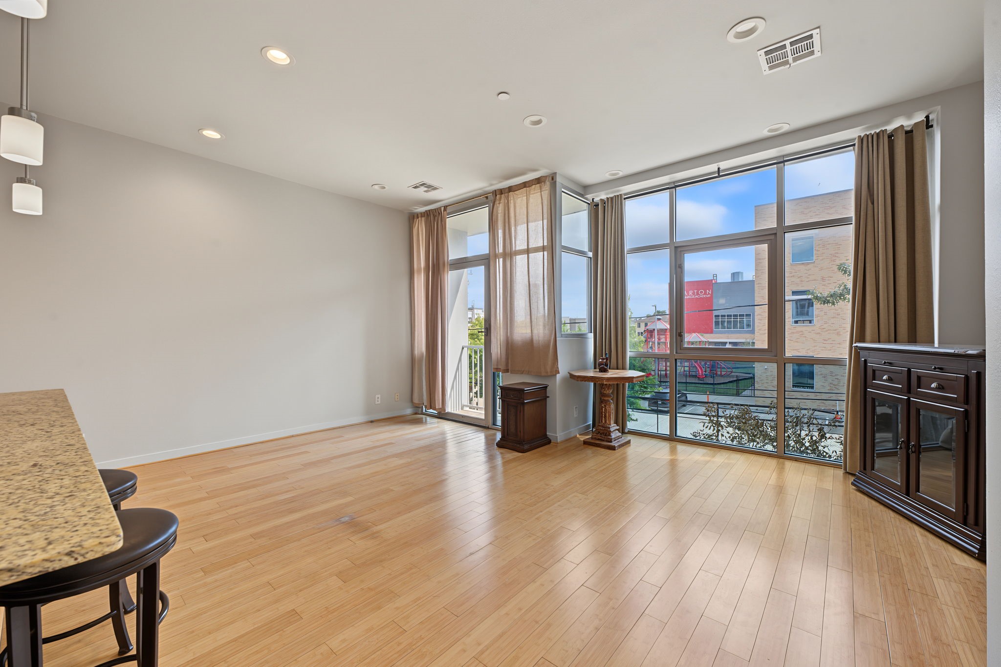 A convenient nook provides the perfect spot for a home office or computer station without sacrificing valuable living space! Step outside onto the adjoining balcony to enjoy a breath of fresh air and take in the surrounding city atmosphere.