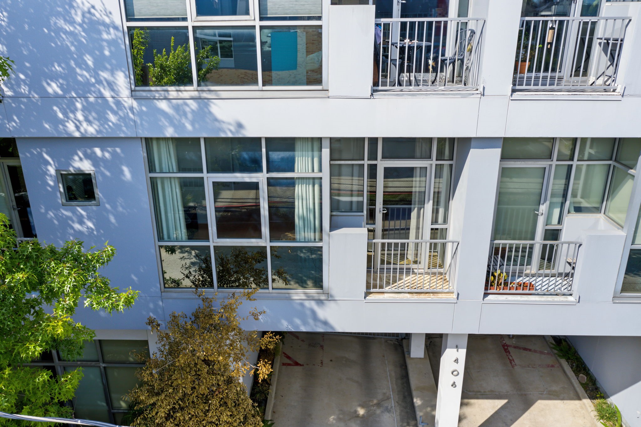 An abundance of windows welcomes natural light into this stylish condo, creating a bright, airy atmosphere throughout the living spaces. Step outside onto your private balcony to enjoy a breath of fresh air, take in the surrounding city views, and soak up the vibrant energy of urban living! An abundance of windows welcomes natural light into this stylish condo, creating a bright, airy atmosphere throughout the living spaces. Step outside onto your private balcony to enjoy a breath of fresh air, take in the surrounding city views, and soak up the vibrant energy of urban living!