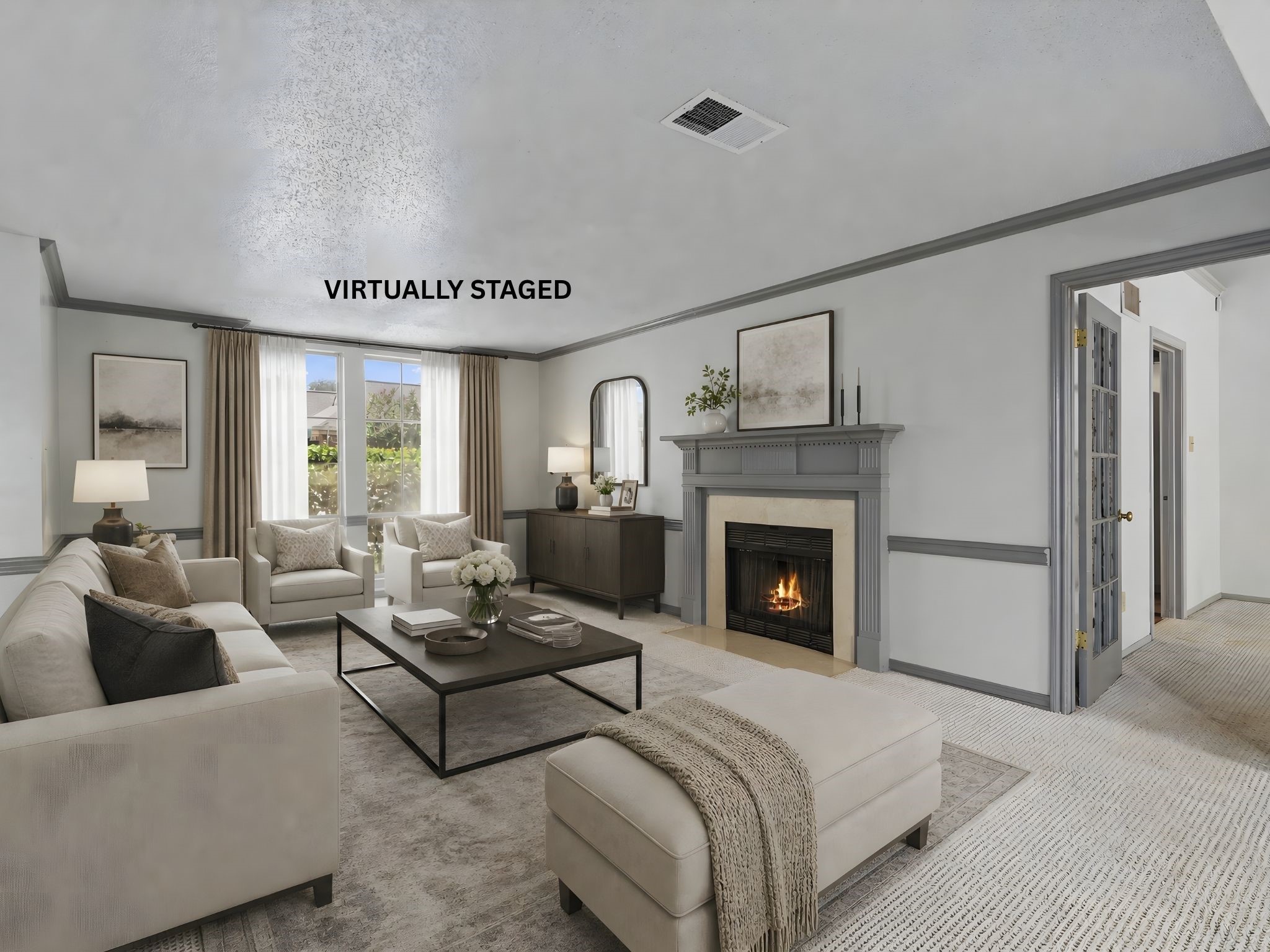 The virtually staged living room centered around the fireplace, highlighting a cozy focal point for relaxing evenings.
