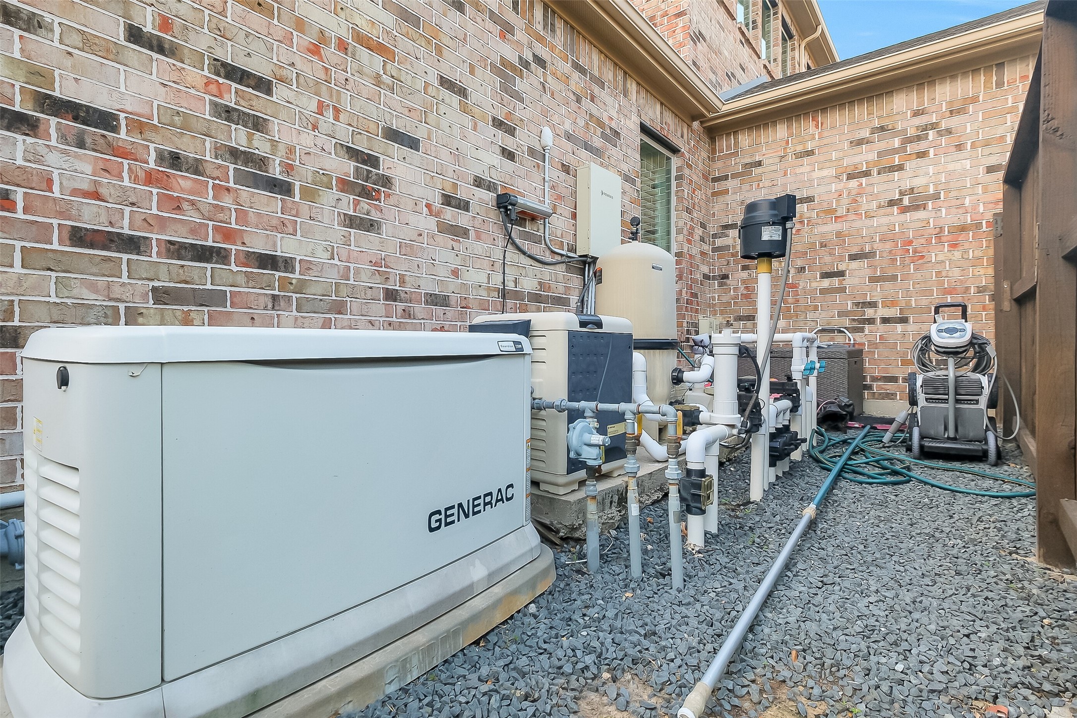 Peace of mind comes standard with a whole-home Generac generator and a whole-home water softener system, keeping the household running smoothly no matter what. Tucked away nicely behind a fence, your equipment is kept out of view of the pool.
