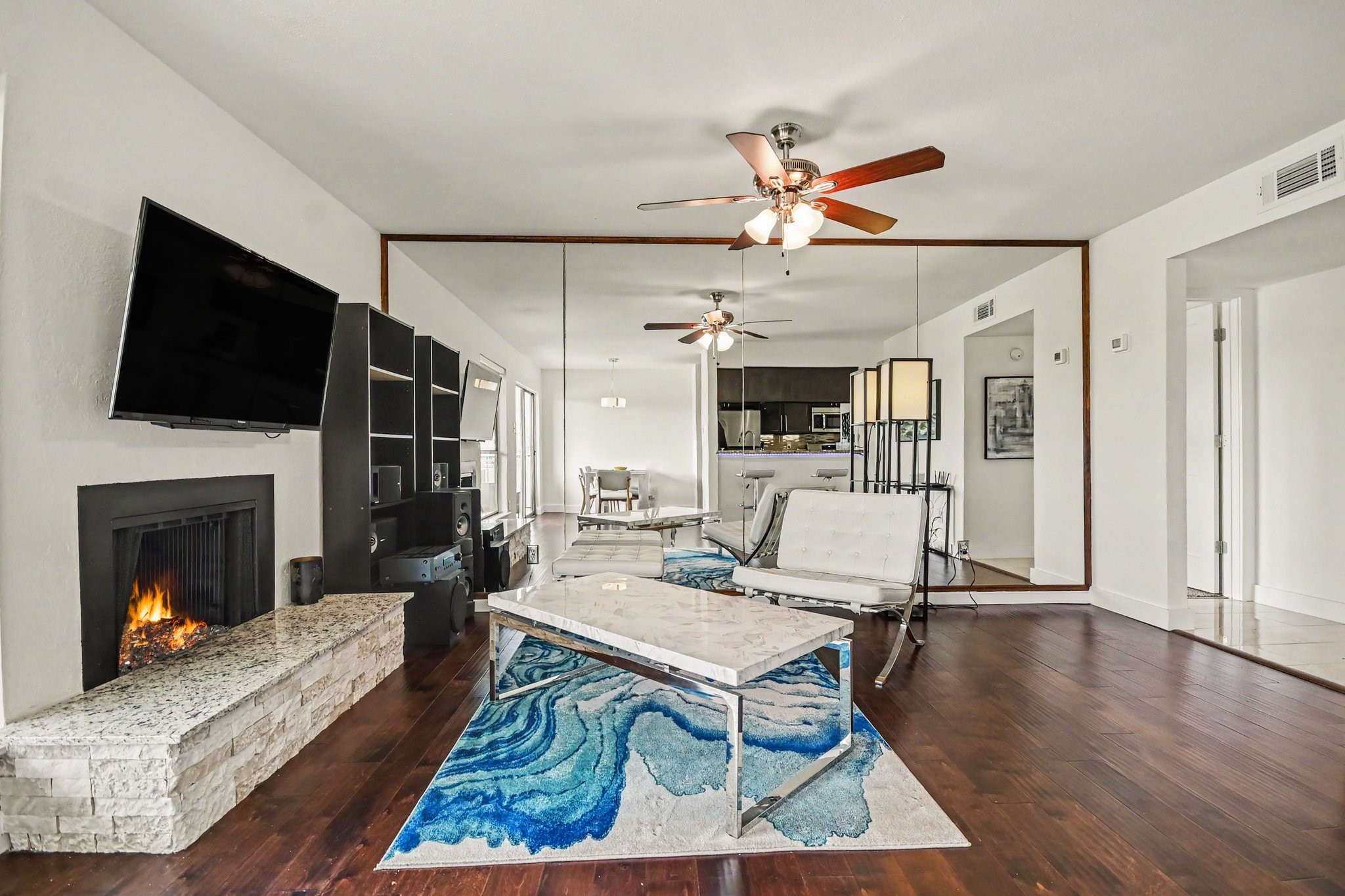 Additional view of the open living area and fireplace