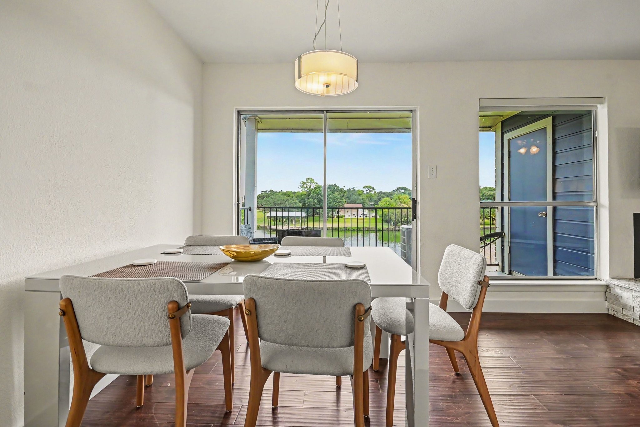Dining area with natural light and balcony access