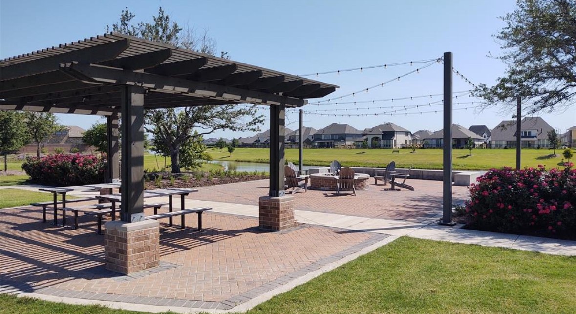 Enjoy beautifully maintained outdoor gathering spaces and shaded seating areas throughout the community.