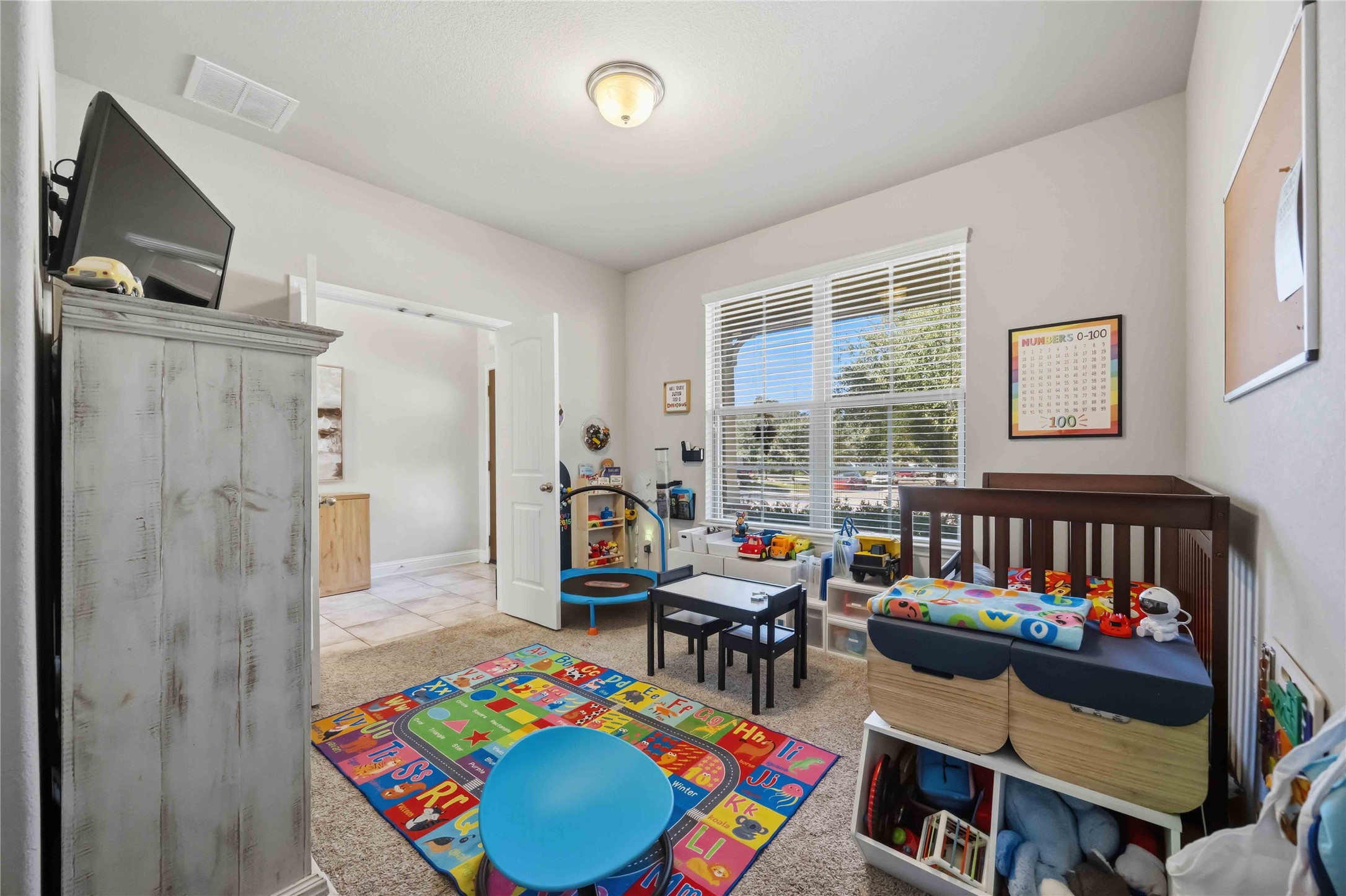 The main-floor study is shown here as a bedroom, so it's ready to be an office, guest room, or nursery.