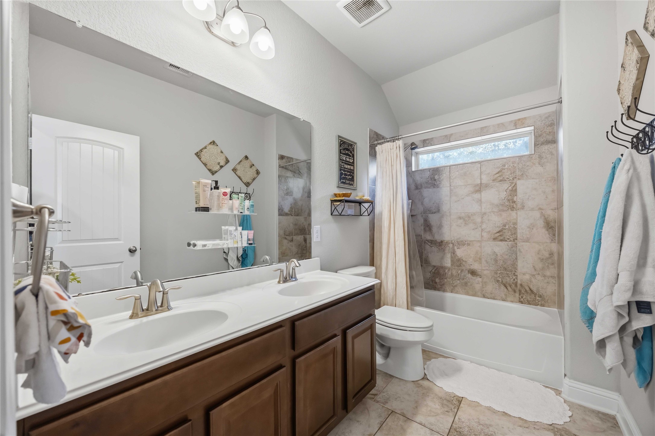 The secondary bath keeps things easy with a shower and tub combo.