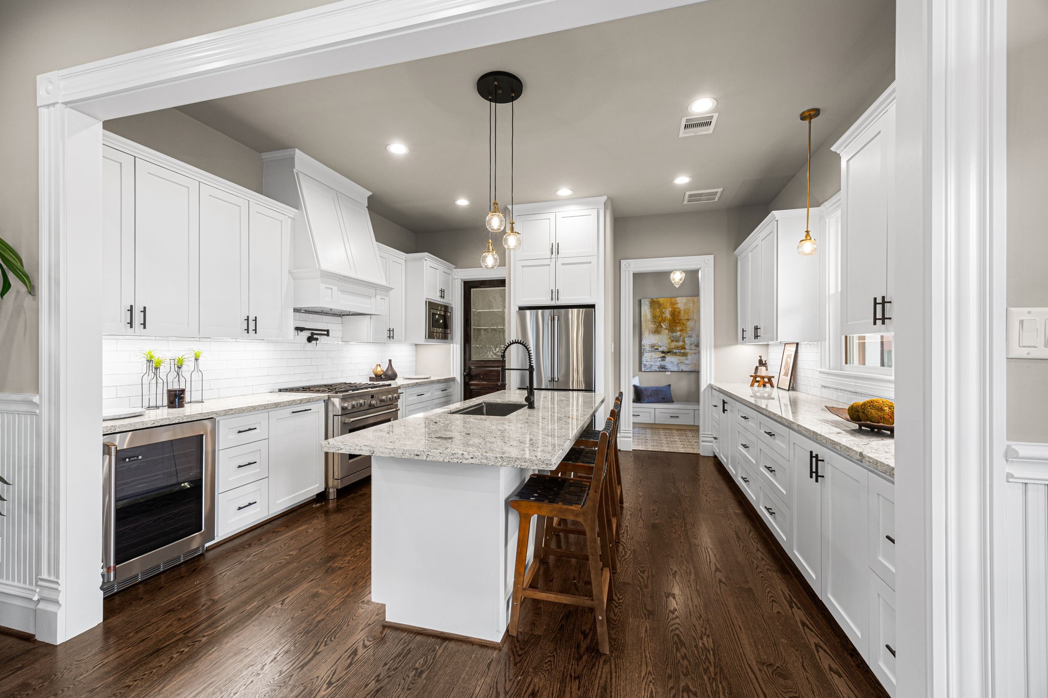 What a great space designed for the cook to have their space, and guests to interact and have their space in the kitchen.