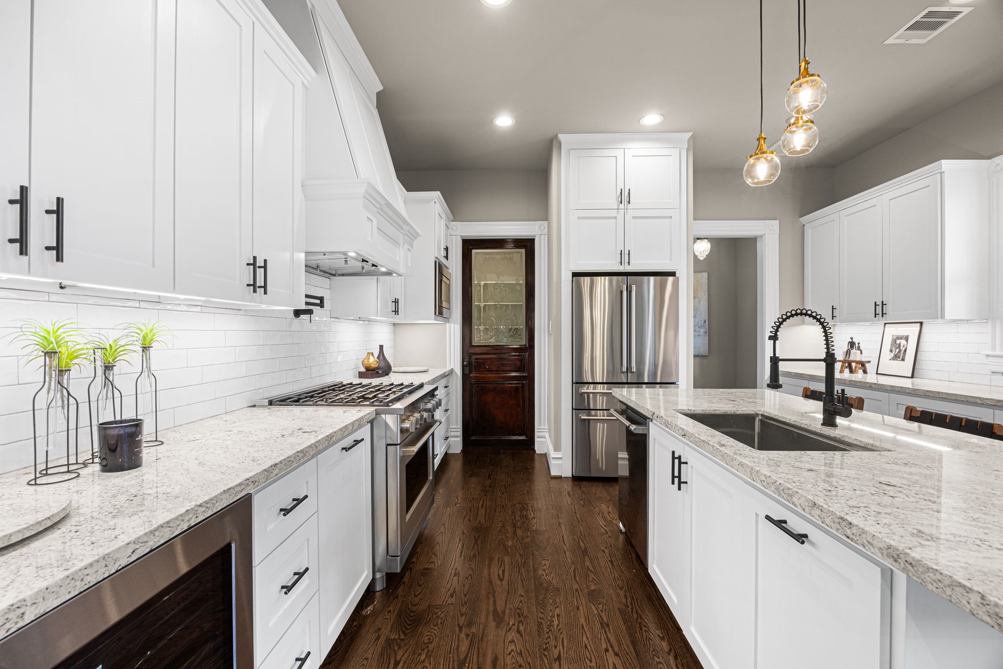 You will love the reclaimed historic wood door that leads to the walk-in pantry!