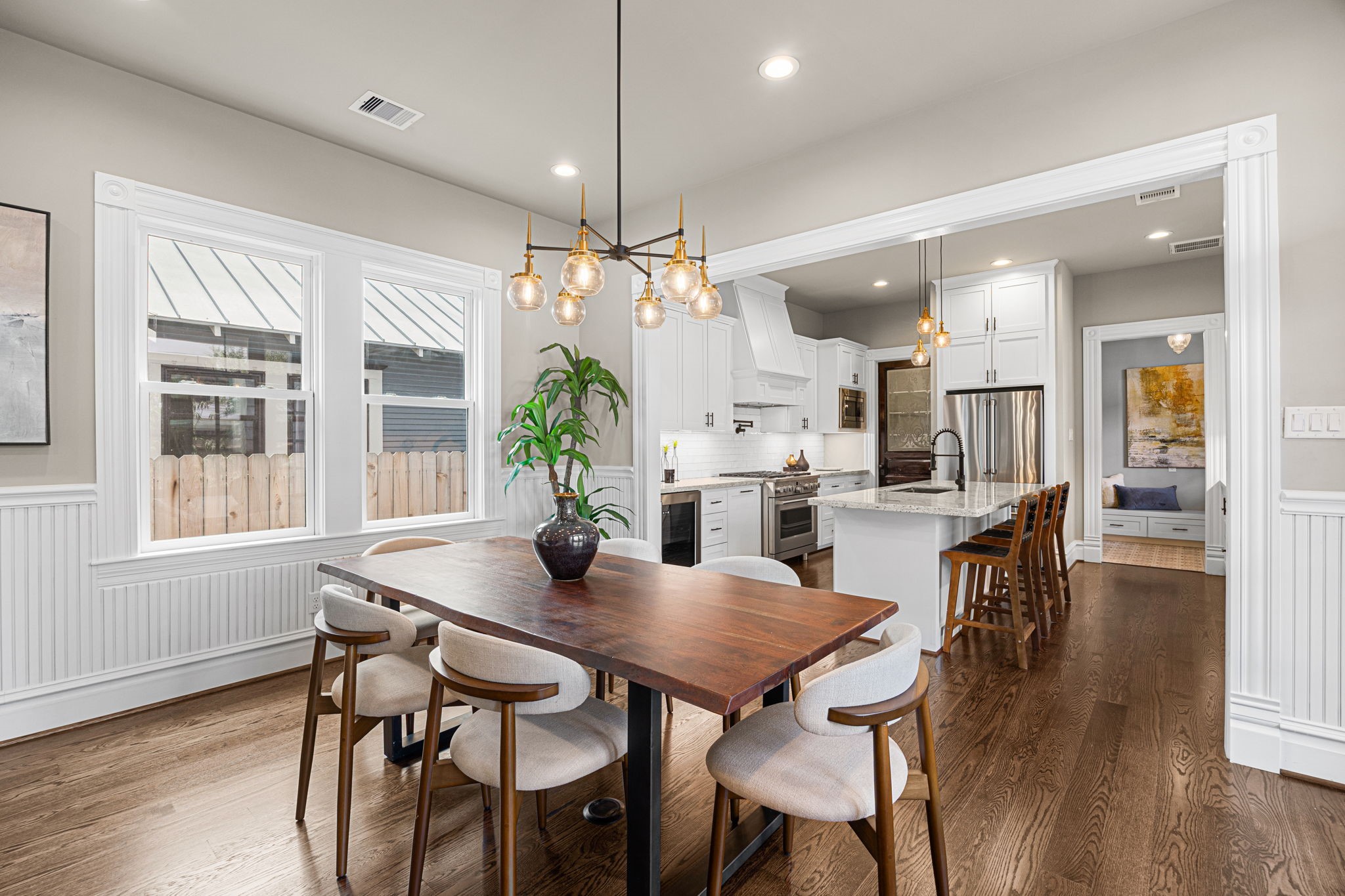 Adjacent to the kitchen is your dining area, which can comfortably accommodate seating for 6-10.