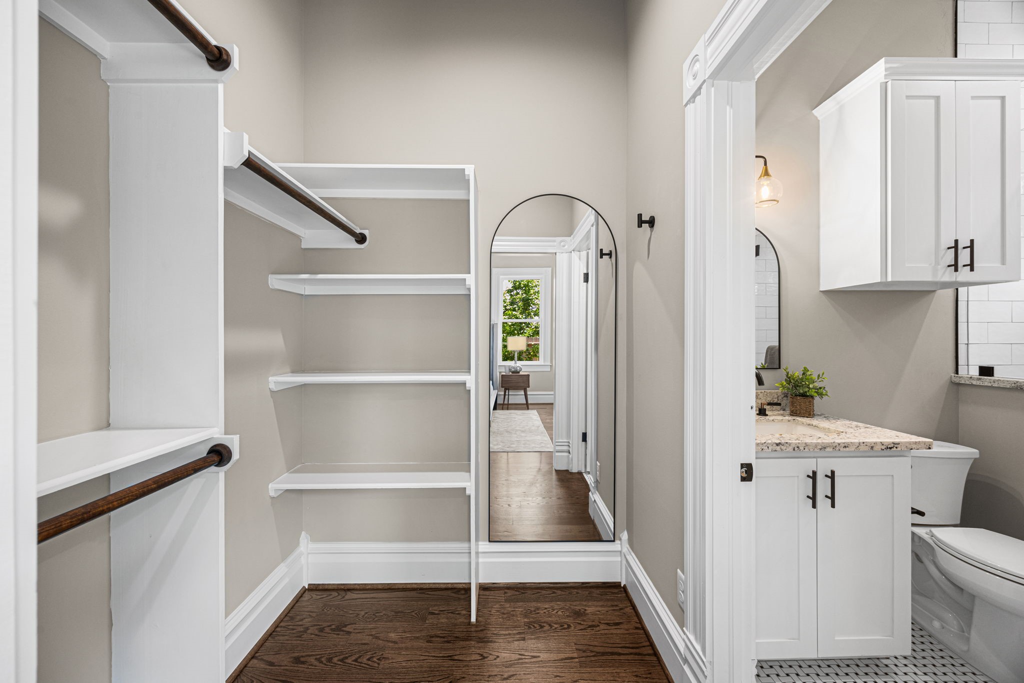 What an efficient design. This is the walk-in closet and en-suite bathroom to the 1st floor bedroom.