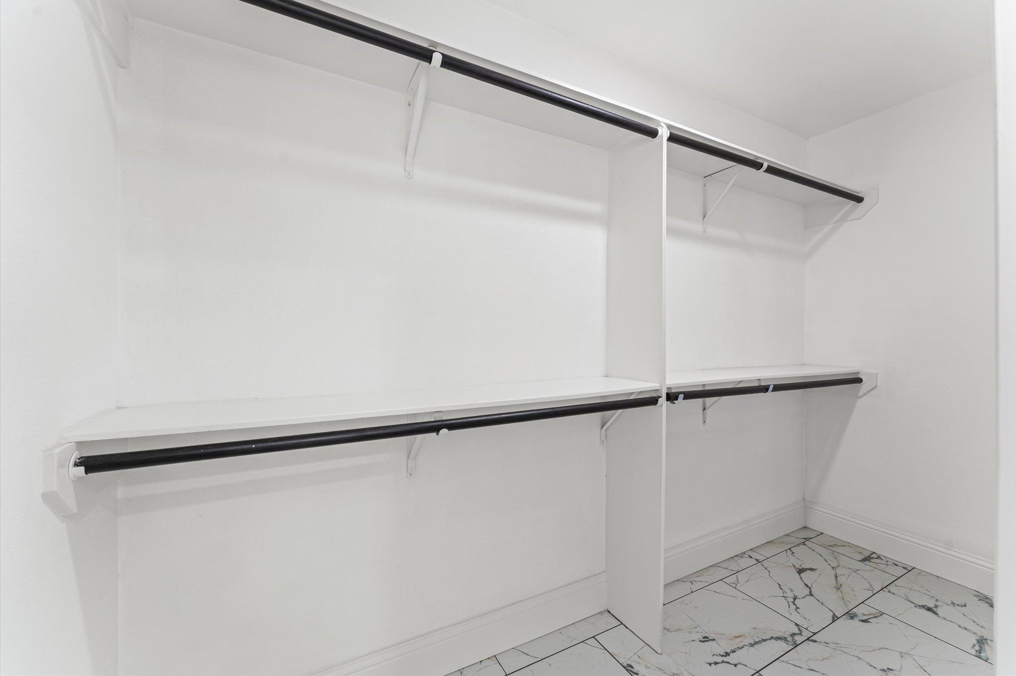 The Primary Bedroom's walk-in closet is accessed through the Primary Bath.