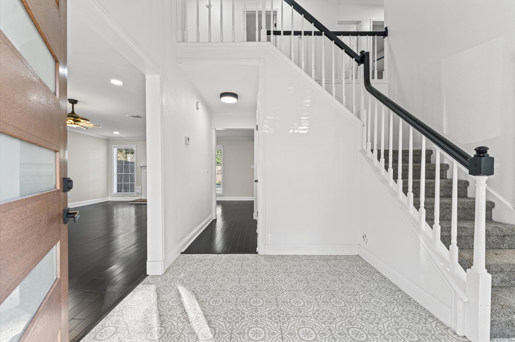 The two-story entry opens to the Living Room on your left and the formal Dining Room on your right. The two-story entry opens to the Living Room on your left and the formal Dining Room on your right.