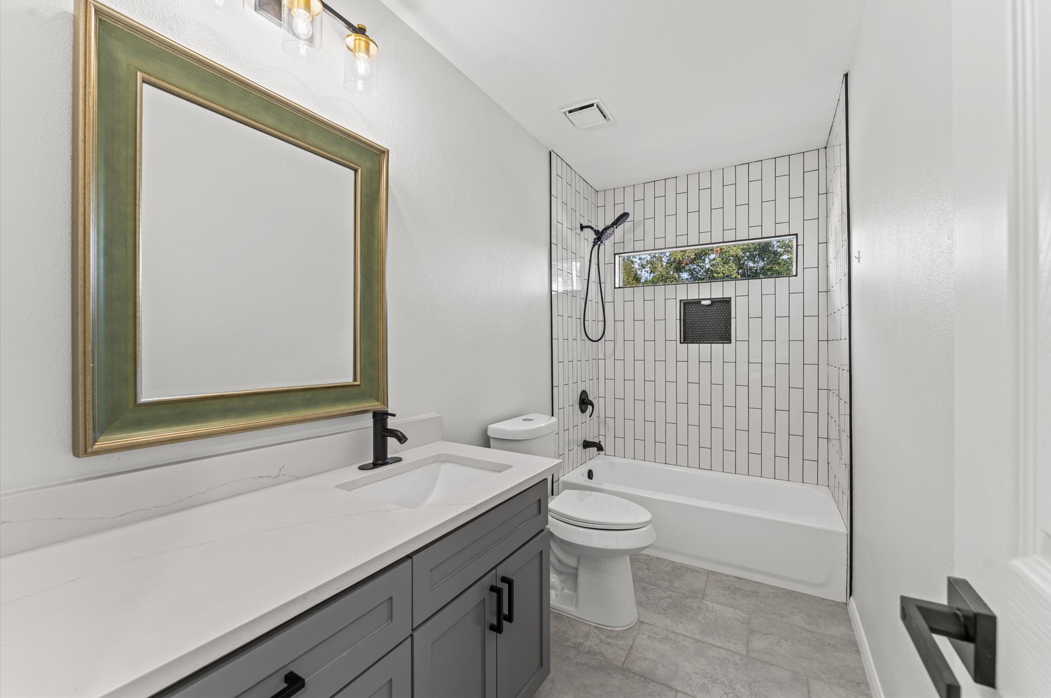 The second-floor secondary bathroom features a tub/shower combination.