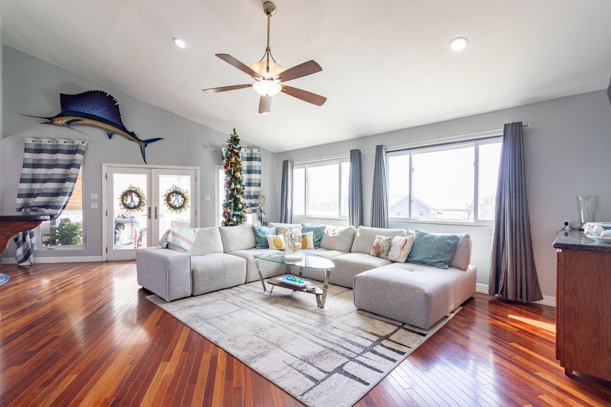 Spacious living room, bay view from the big picture windows  Brazilian Hardwood Cherry floors