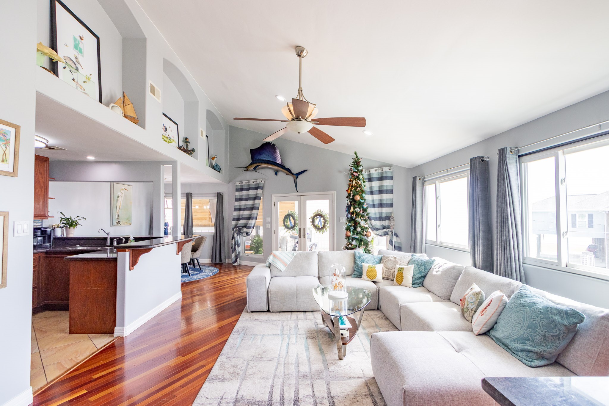 Spacious living room, bay view from the big picture windows  Brazilian Hardwood Cherry floors