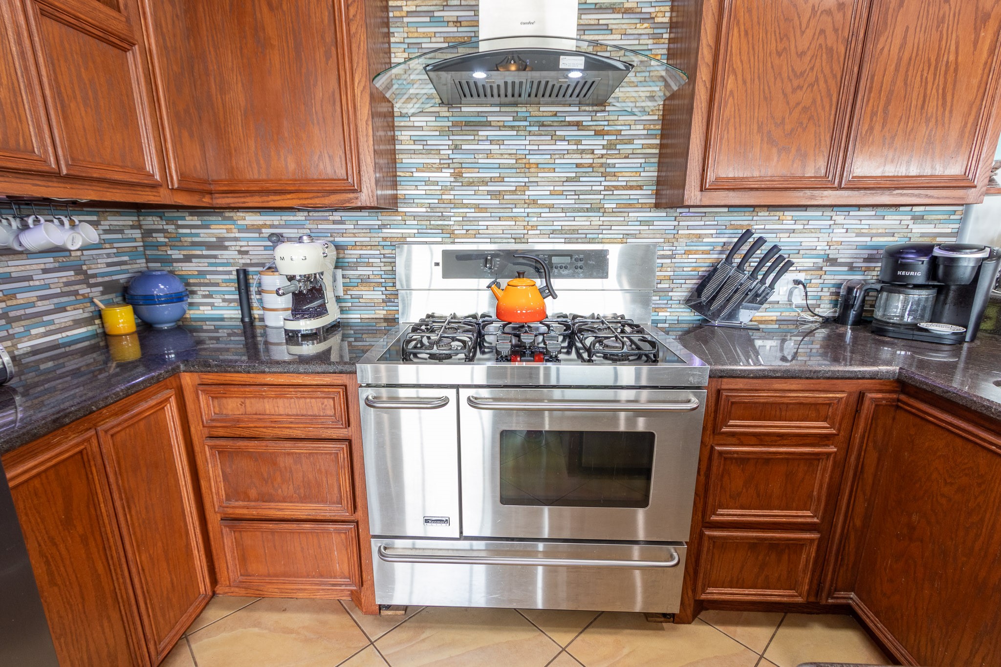 Six burner Gas cooktop, double electric oven, SS appliances
