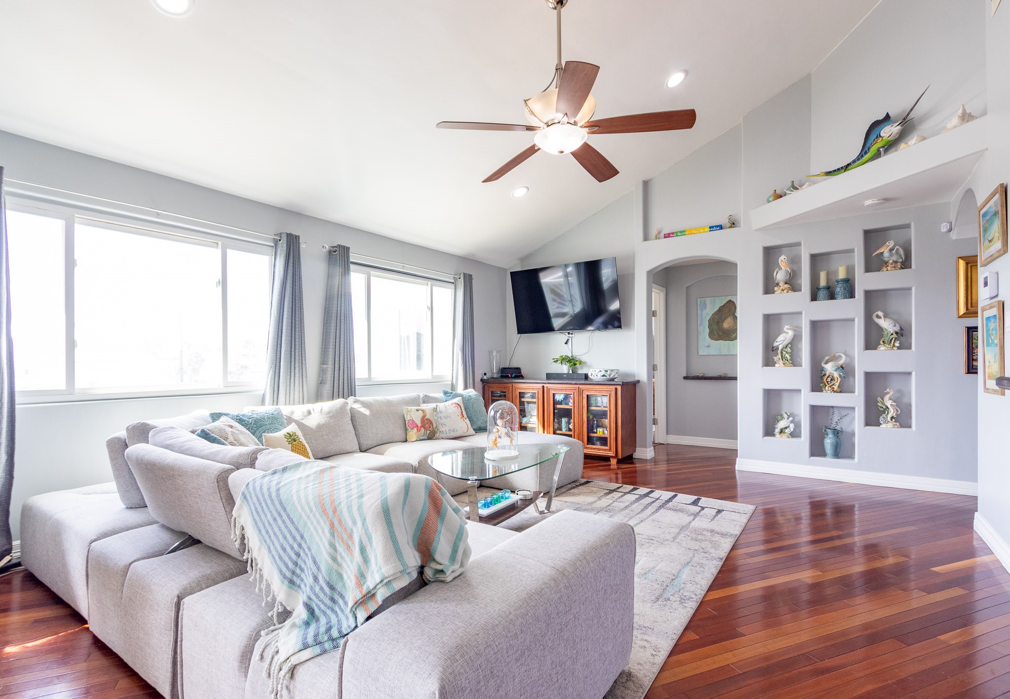Spacious living room, bay view from the big picture windows Brazilian Hardwood Cherry floors Spacious living room, bay view from the big picture windows Brazilian Hardwood Cherry floors