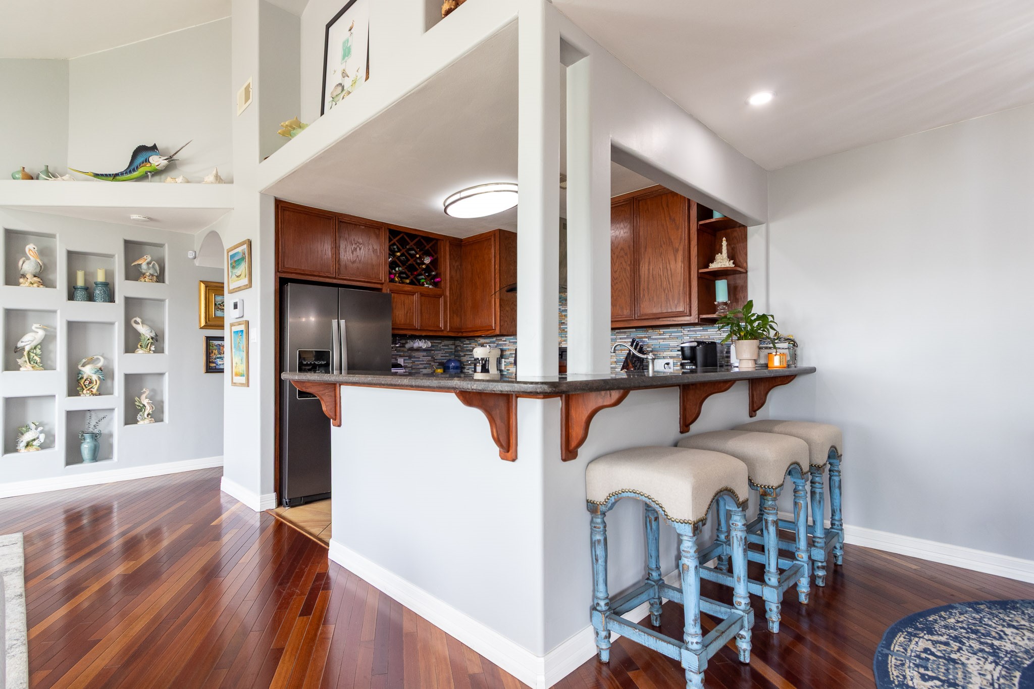 Spacious living room, bay view from the big picture windows  Brazilian Hardwood Cherry floors