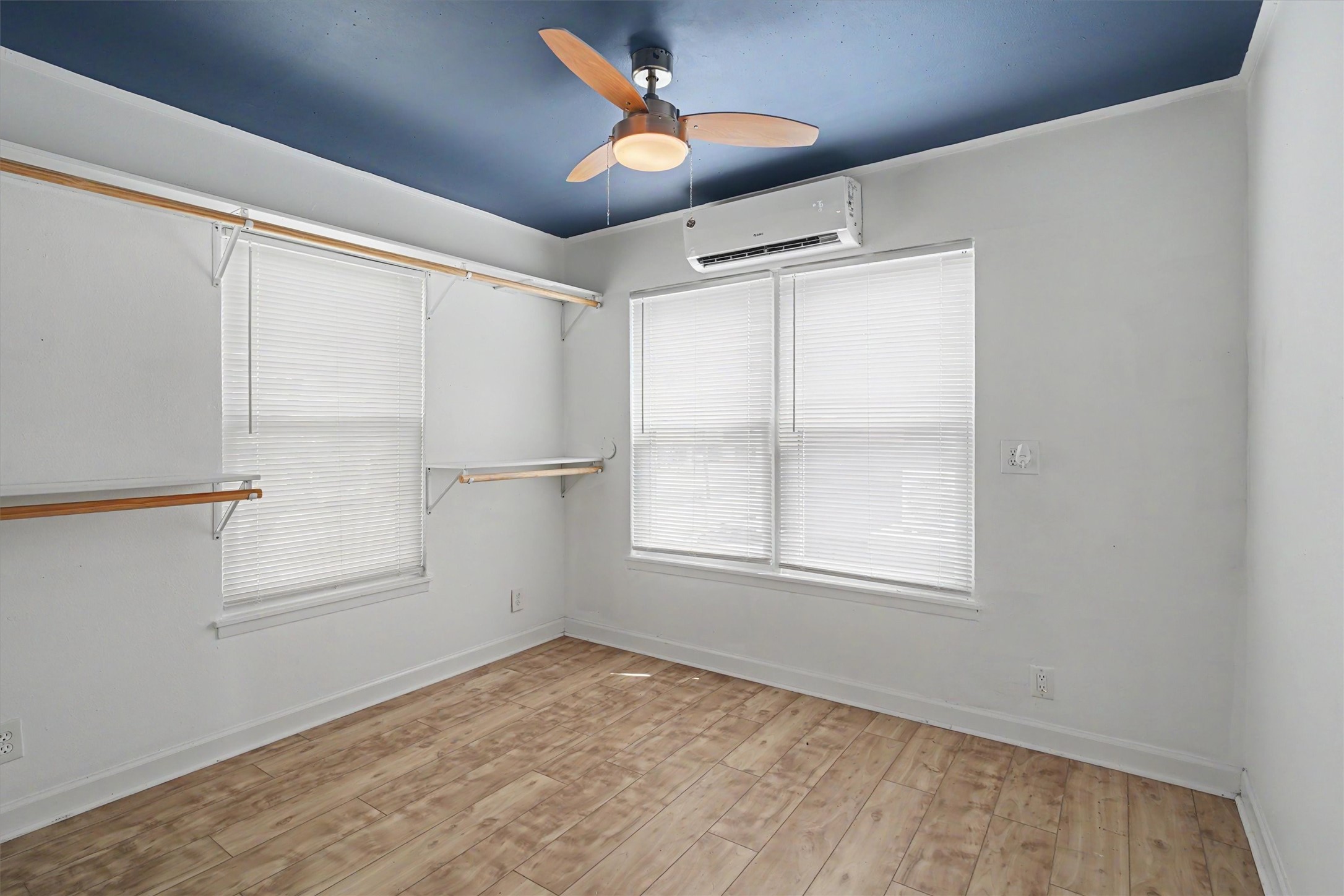 Bedroom that was previously used as a closet but the home is a 2 bedroom home upstairs or a 1 bedroom with a super large closet area