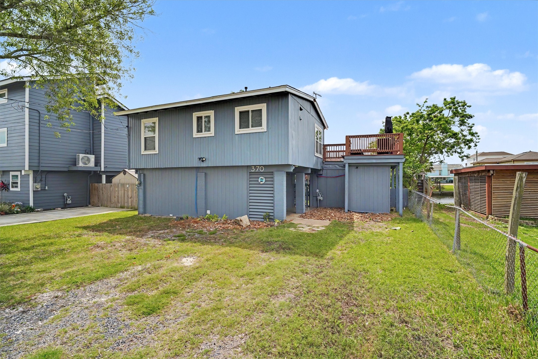 Yes, there's not a concrete driveway. The home is priced with exterior updates needed