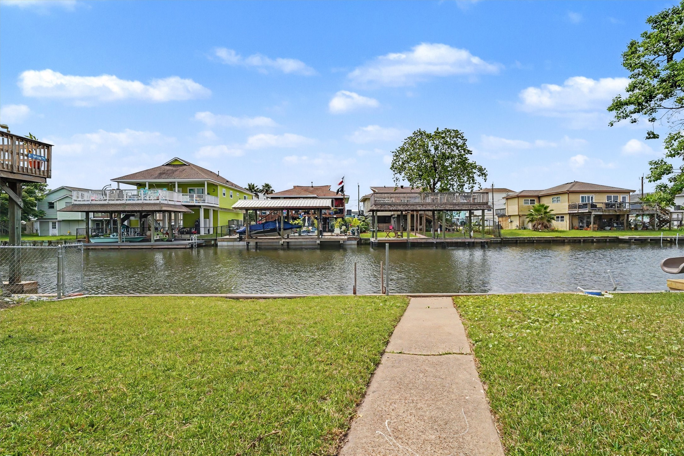 Sidewalk to the water. The home's price allows you to add some exterior updates and still fall in budget