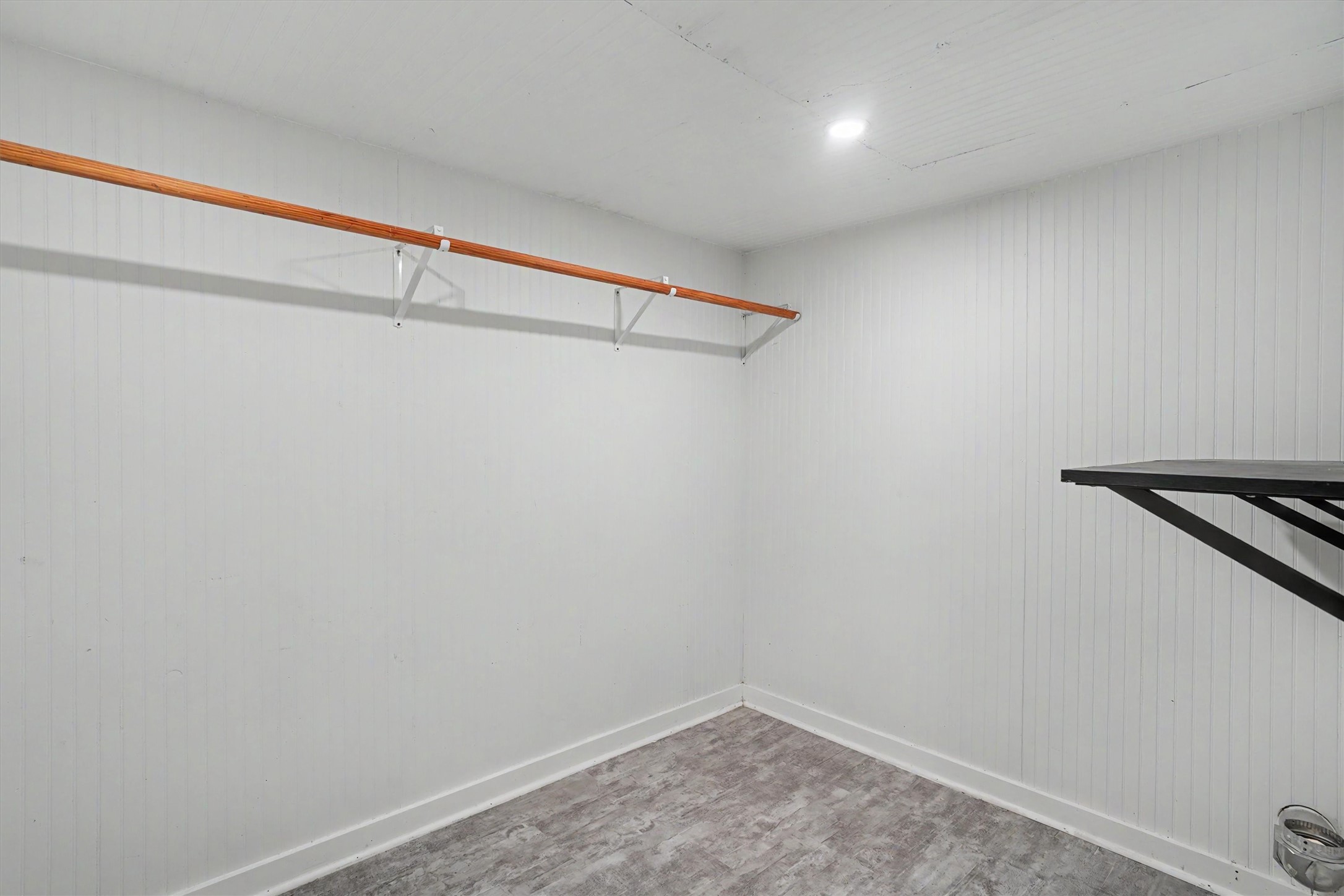 Over sized walk in closet downstairs which could be used for clothes or storage items