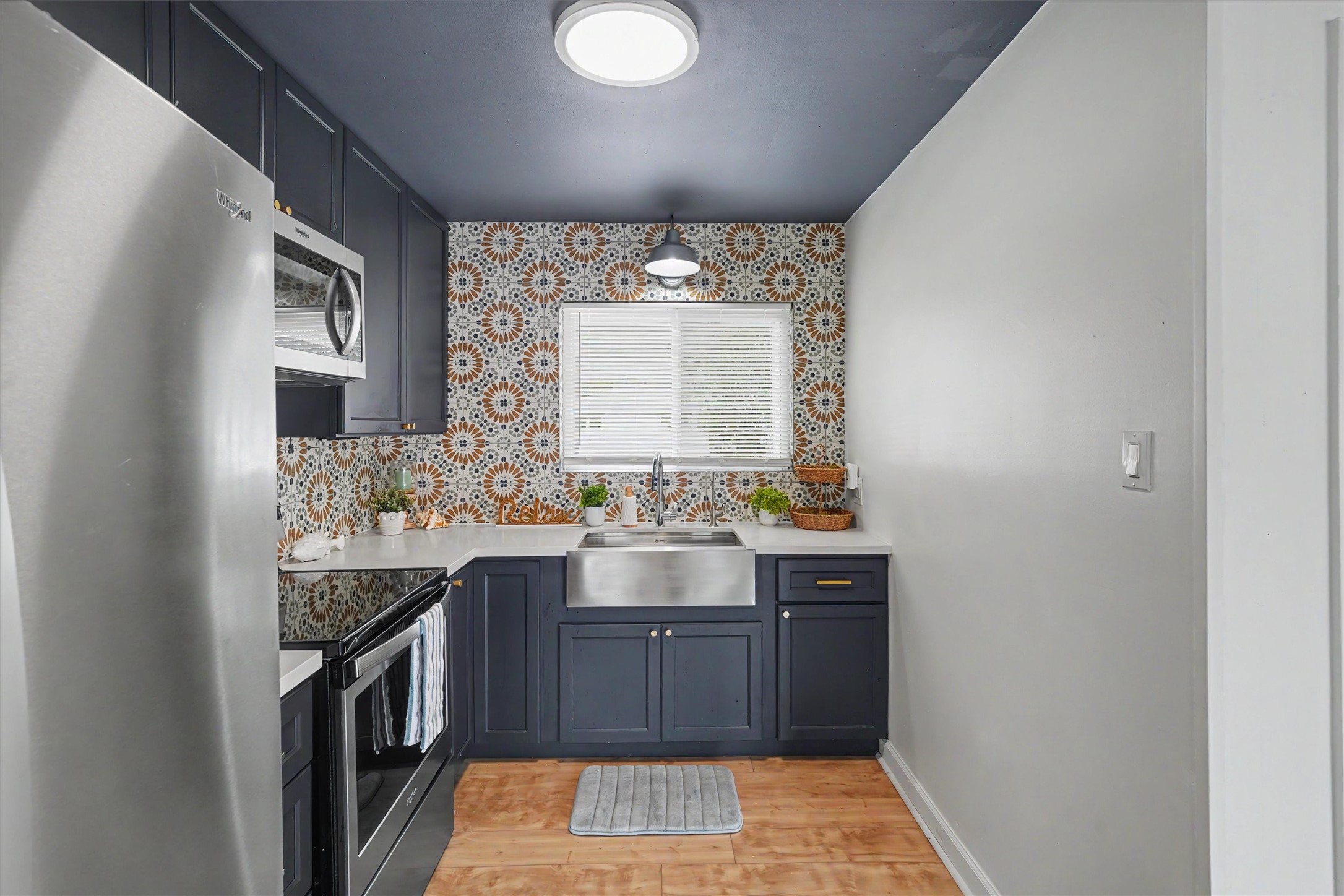 Kitchen is small but functional and provides everything needed to cook a delicious meal. The open concept allows the chef to visit with friends in the living area