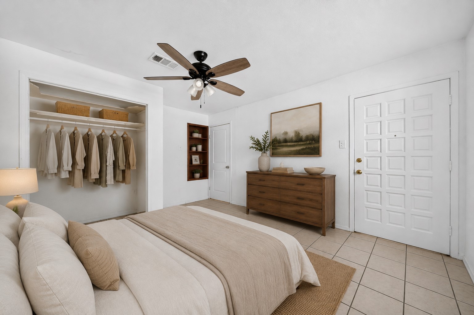 Comfortable bedroom with generous closet space and a relaxed atmosphere.